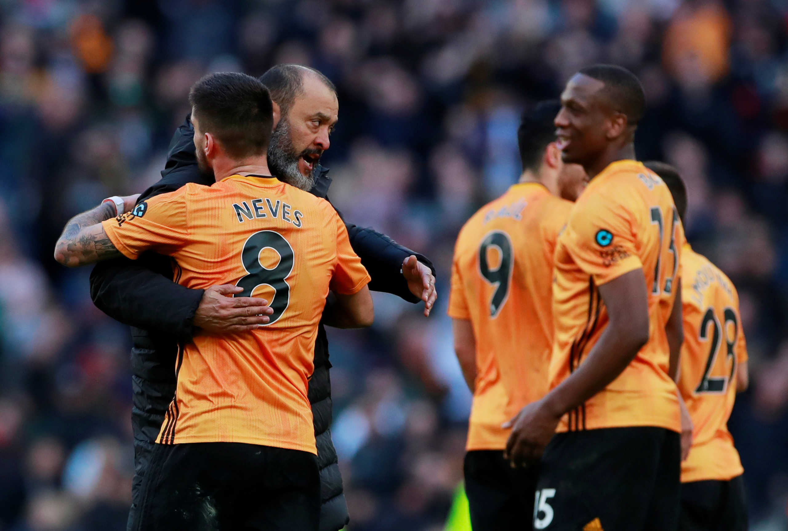 Soccer Football - Premier League - Tottenham Hotspur v Wolverhampton Wanderers - Tottenham Hotspur Stadium, London, Britain - March 1, 2020  Wolverhampton Wanderers manager Nuno Espirito Santo celebrates with Ruben Neves and teammates after the match   Action Images via Reuters