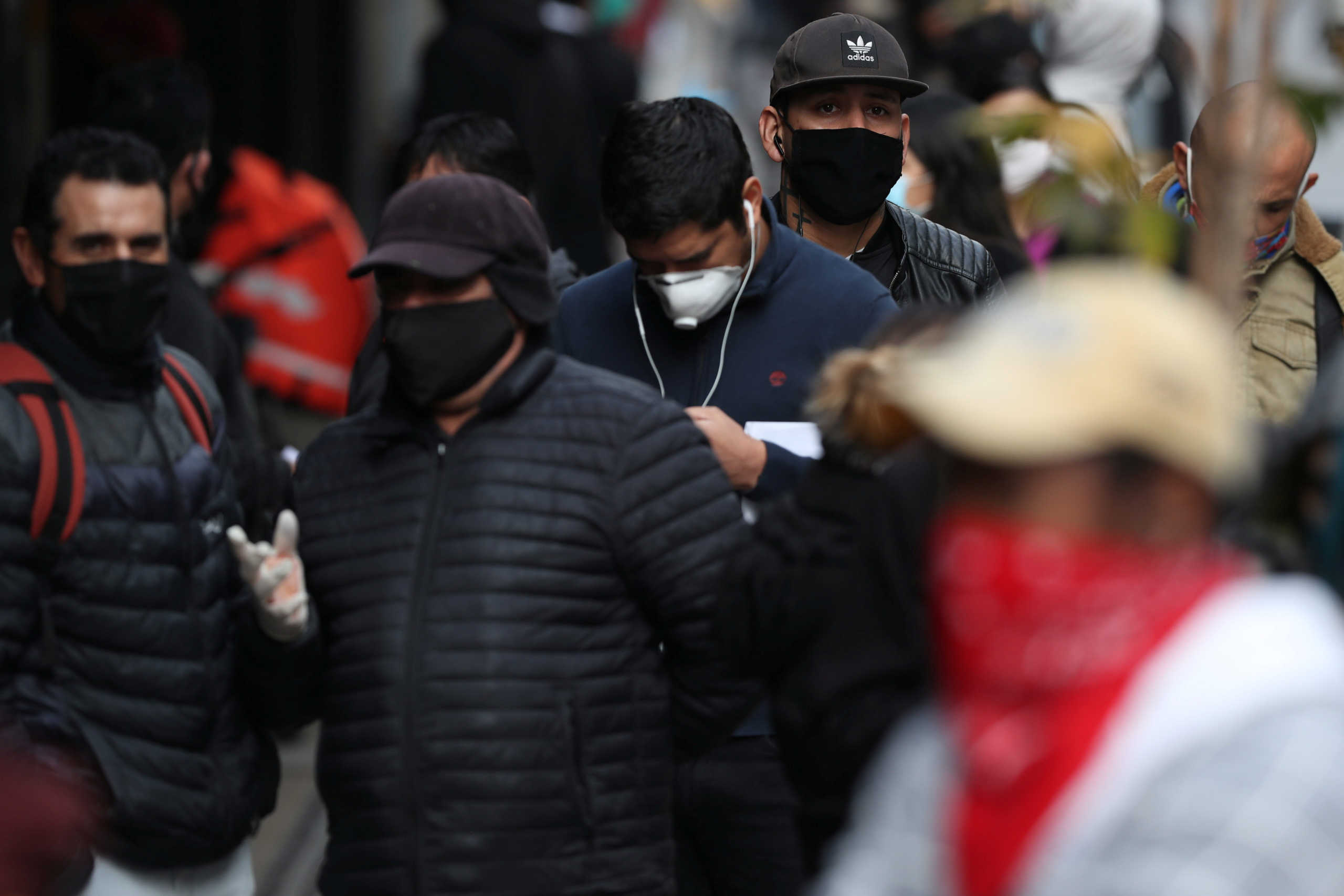 Unemployed people gather to apply for unemployment insurance outside of the office of an unemployment fund administrator, amid the spread of the coronavirus disease (COVID-19) in Santiago, Chile May 29, 2020. REUTERS