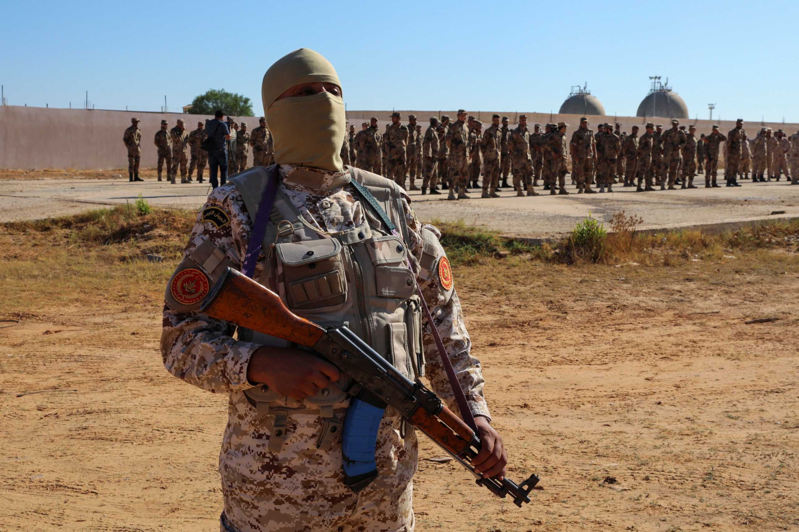 Members of the Petroleum Facilities Guard are seen at the Azzawiya oil refinery, in Zawiyah, west of Tripoli, Libya July 23, 2020. REUTERS