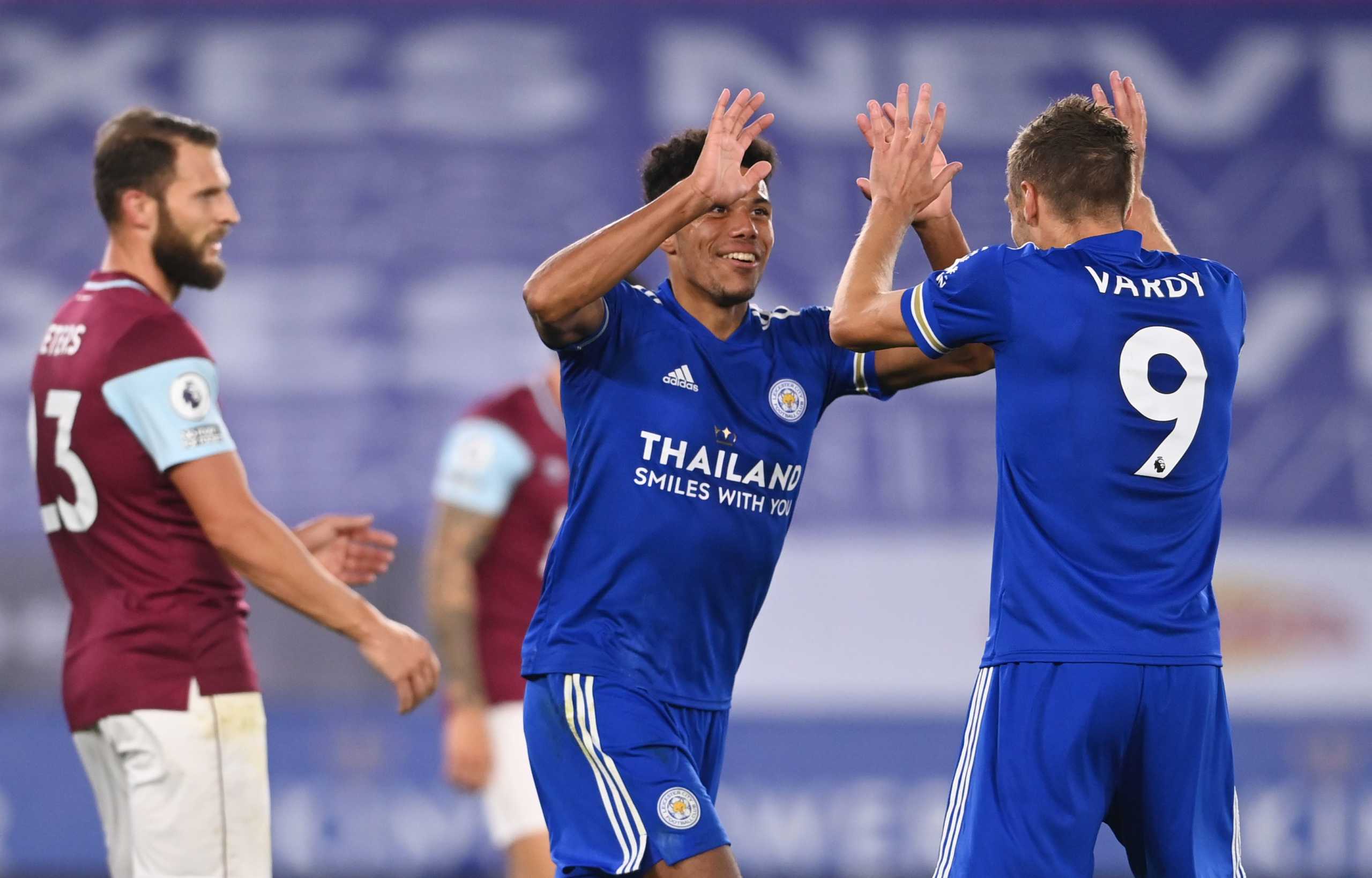 Soccer Football - Premier League - Leicester City v Burnley - King Power Stadium, Leicester, Britain - September 20, 2020 Leicester City's James Justin celebrates scoring their third goal with Jamie Vardy Pool via REUTERS