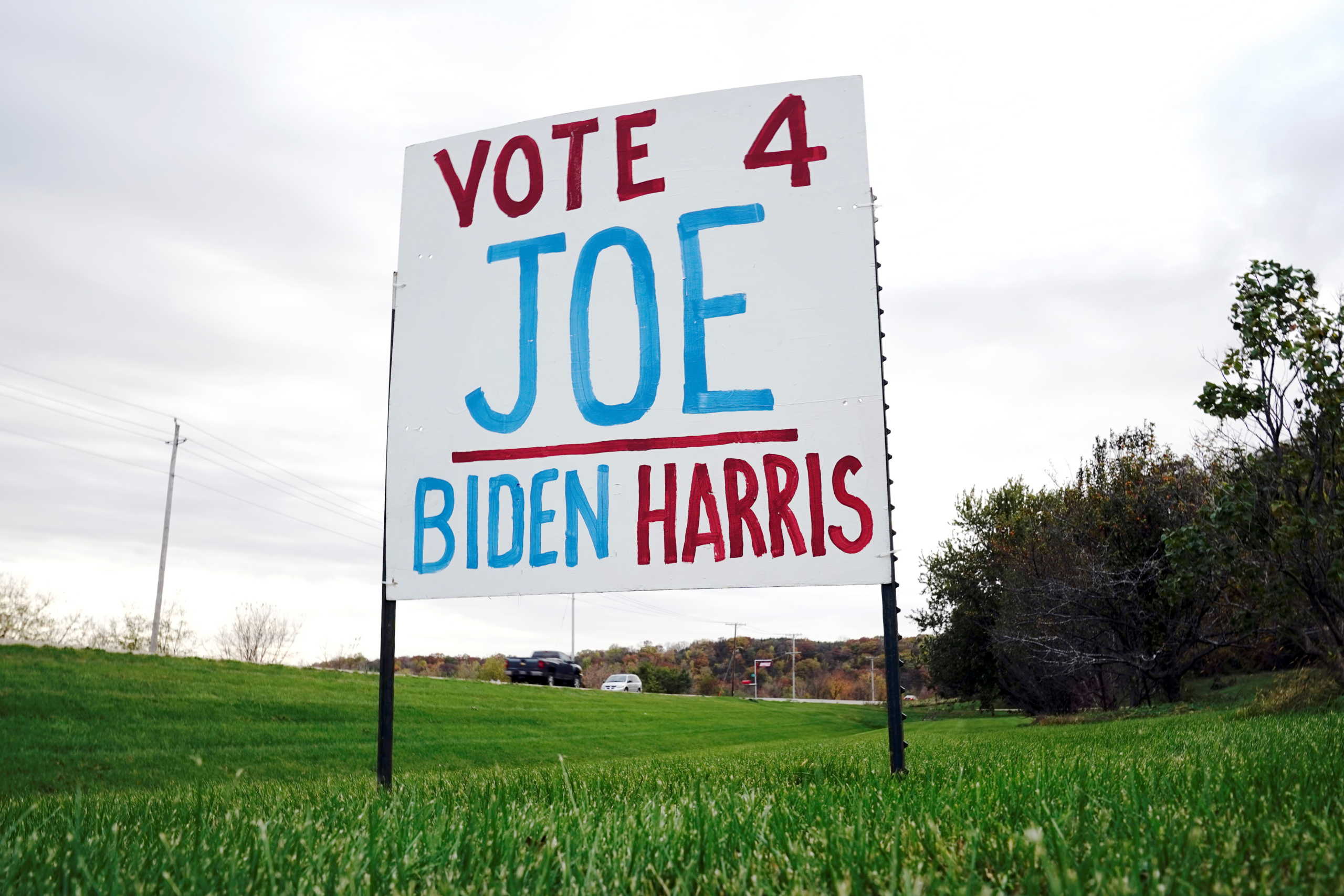 A handmade yard sign supporting U.S. Democratic presidential candidate Joe Biden and his running mate, Senator Kamala Harris, is seen in Middleton, Wisconsin, U.S., October 17, 2020. Picture taken October 17, 2020. REUTERS