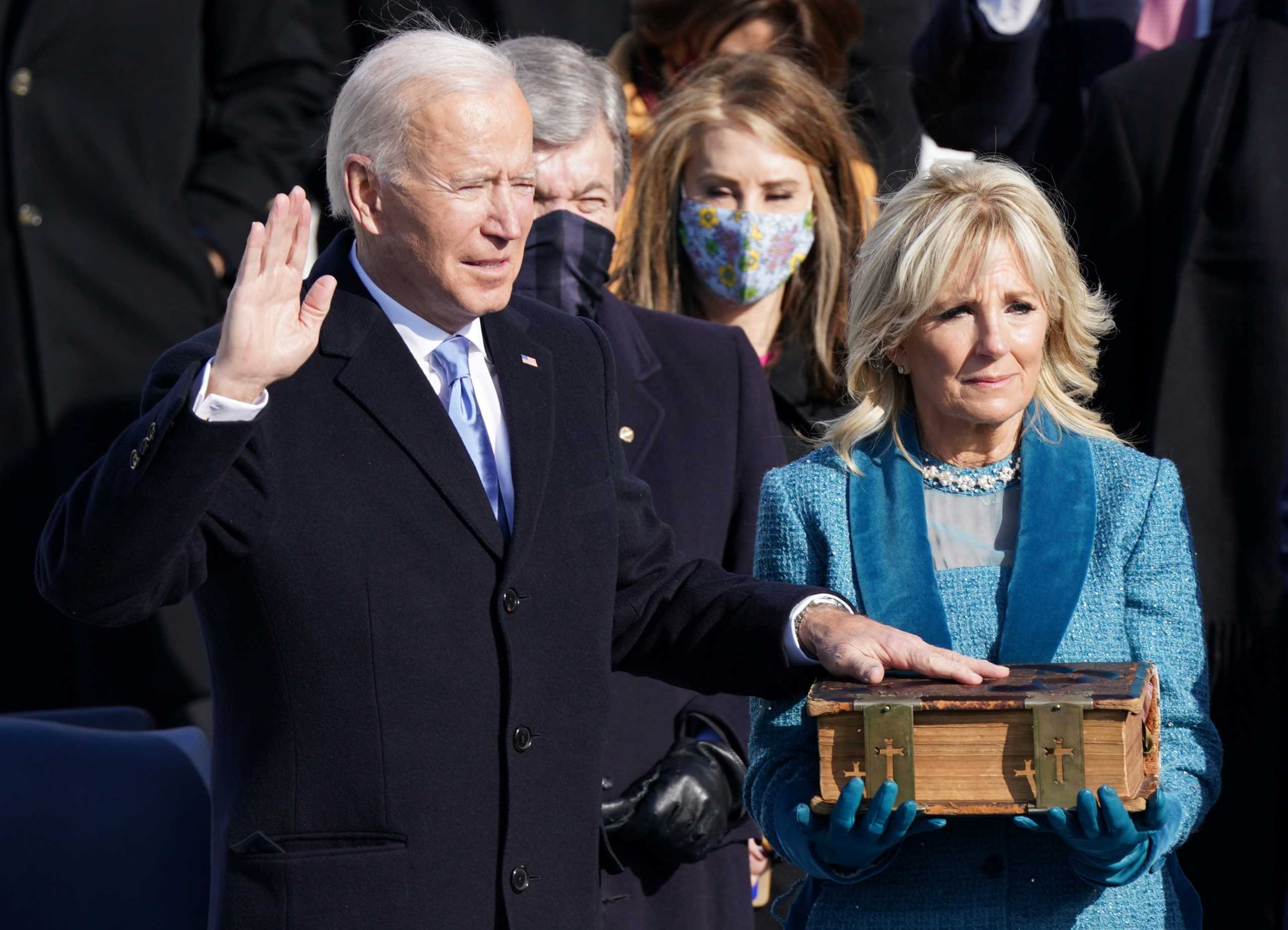 Joe Biden is sworn in as the 46th President of the United States on the West Front of the U.S. Capitol in Washington, U.S., January 20, 2021. REUTERS