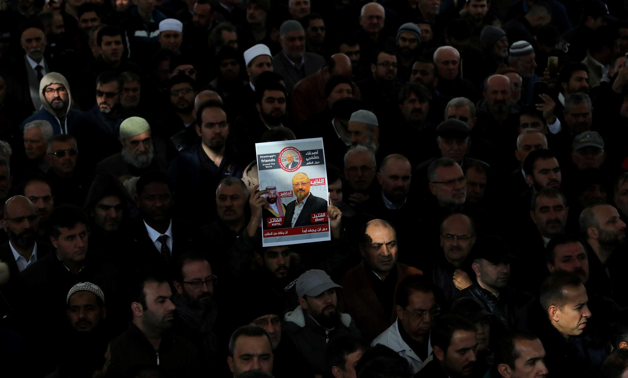 FILE PHOTO: People attend a symbolic funeral prayer for Saudi journalist Jamal Khashoggi at the courtyard of Fatih mosque in Istanbul, Turkey November 16, 2018. REUTERS