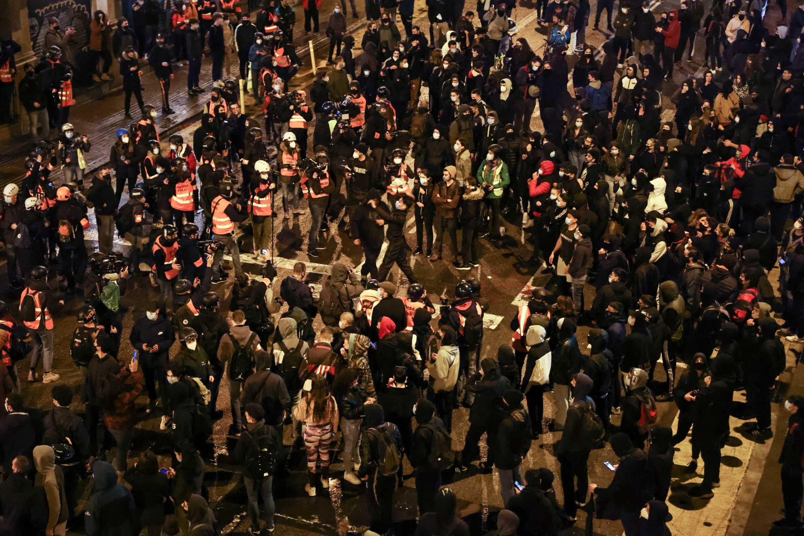 Supporters of arrested Catalan rapper Pablo Hasel protest in Barcelona, Spain, February 22, 2021. REUTERS