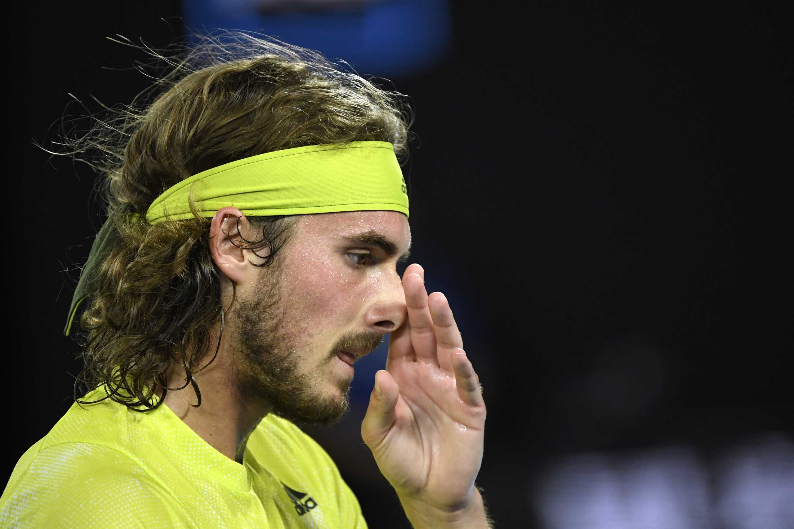 Tennis - Australian Open - Melbourne Park, Melbourne, Australia, February 19, 2021 Greece's Stefanos Tsitsipas reacts during his semi final match against Russia's Daniil Medvedev REUTERS