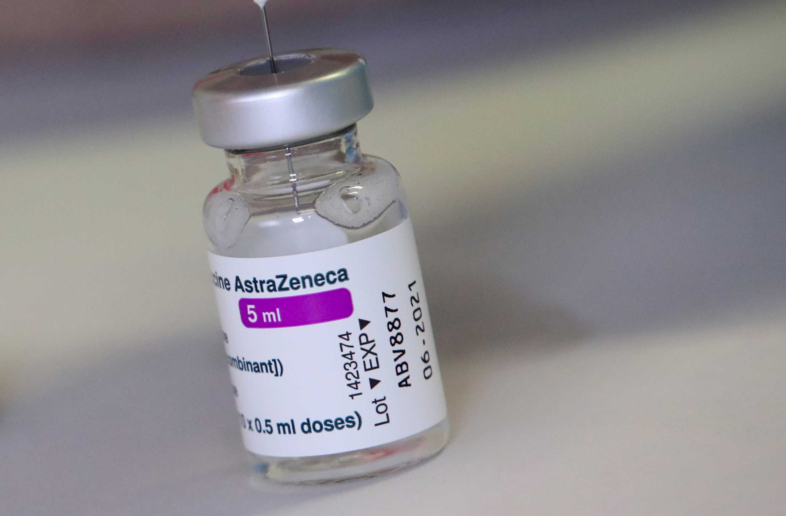 FILE PHOTO: A vial of AstraZeneca COVID-19 vaccine is seen at a vaccination center, amid the coronavirus disease outbreak, in Ronquieres, Belgium April 6, 2021. REUTERS