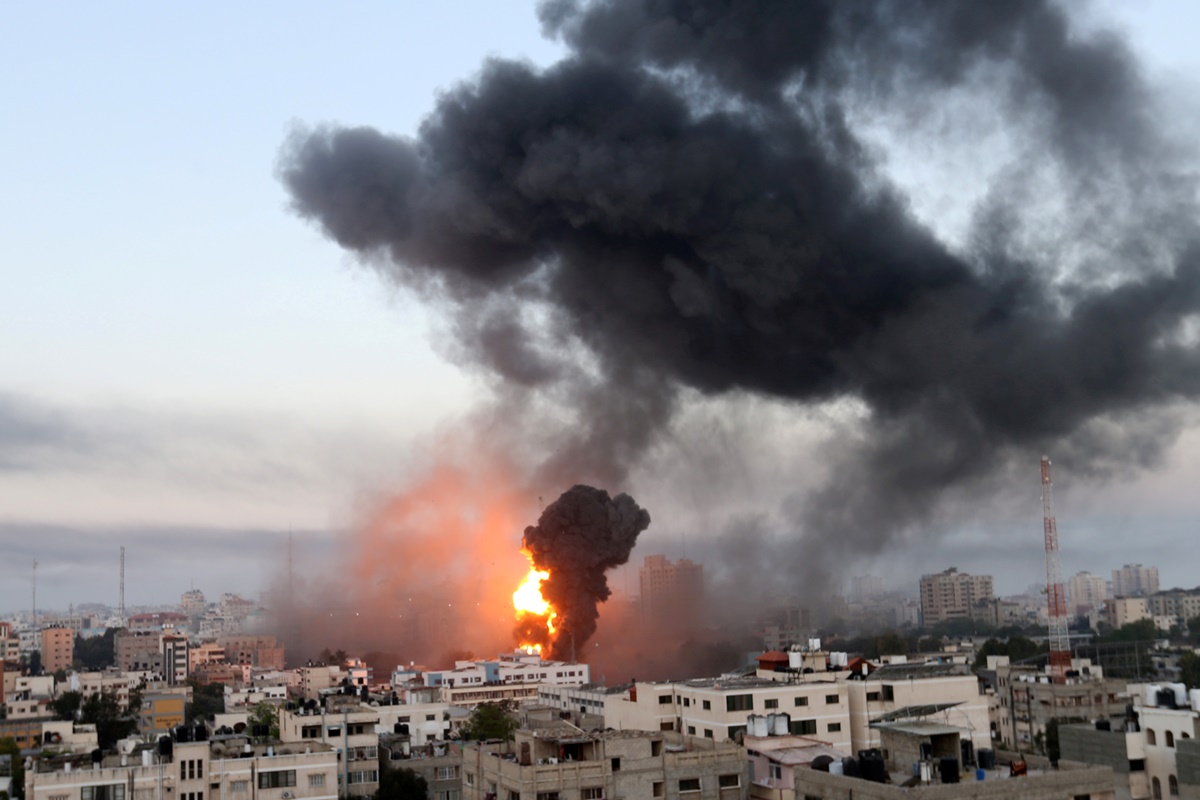 Smoke and flames rise during Israeli air strikes amid a flare-up of Israeli-Palestinian violence, in Gaza May 12, 2021. REUTERS