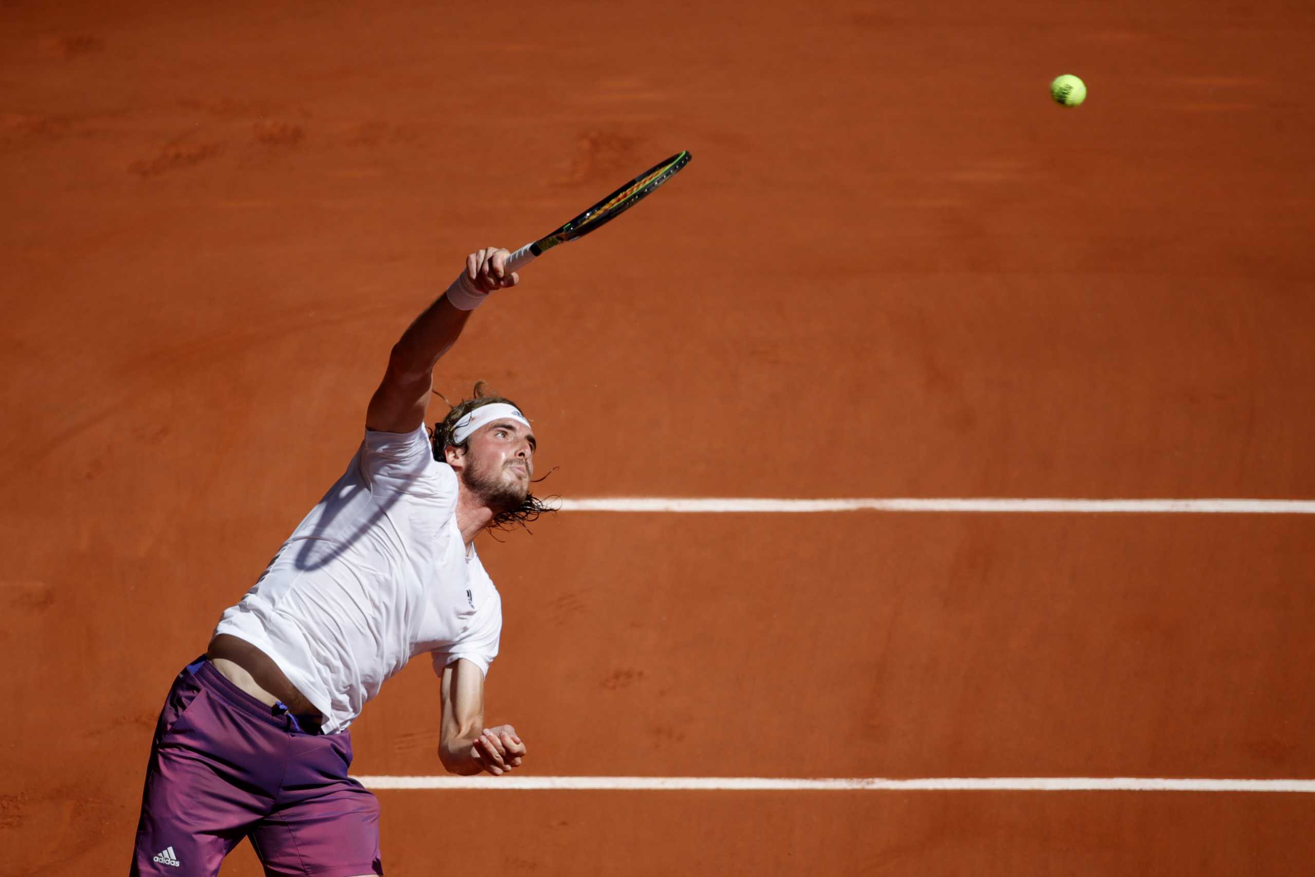 Tennis - French Open - Roland Garros, Paris, France - June 11, 2021 Greece's Stefanos Tsitsipas in action during his semi final match against Germany's Alexander Zverev REUTERS