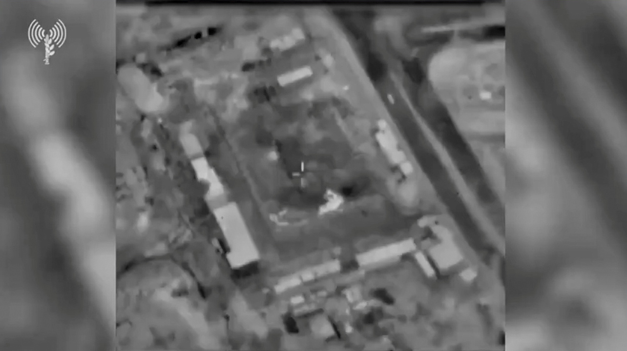 A still image from a video shows buildings in Gaza as seen from a warplane before an air strike June 16, 2021.   Israeli Defence Force (IDF)