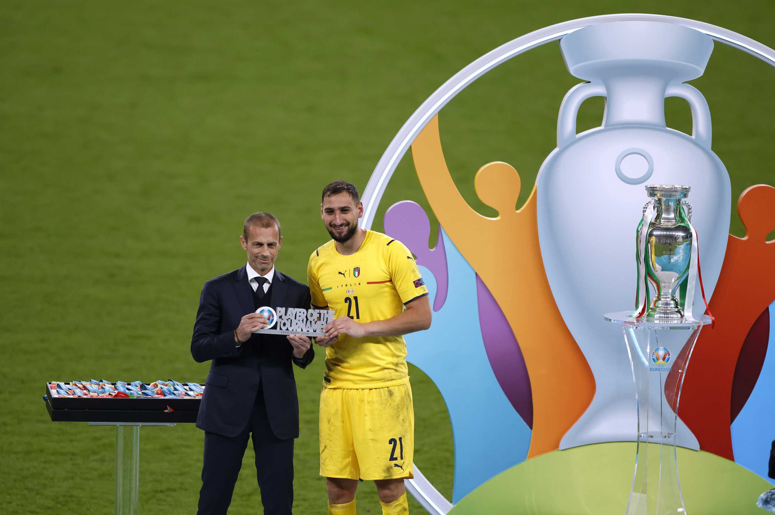 Soccer Football - Euro 2020 - Final - Italy v England - Wembley Stadium, London, Britain - July 11, 2021 Italy's Gianluigi Donnarumma celebrates winning player of the tournament after the match Pool via REUTERS