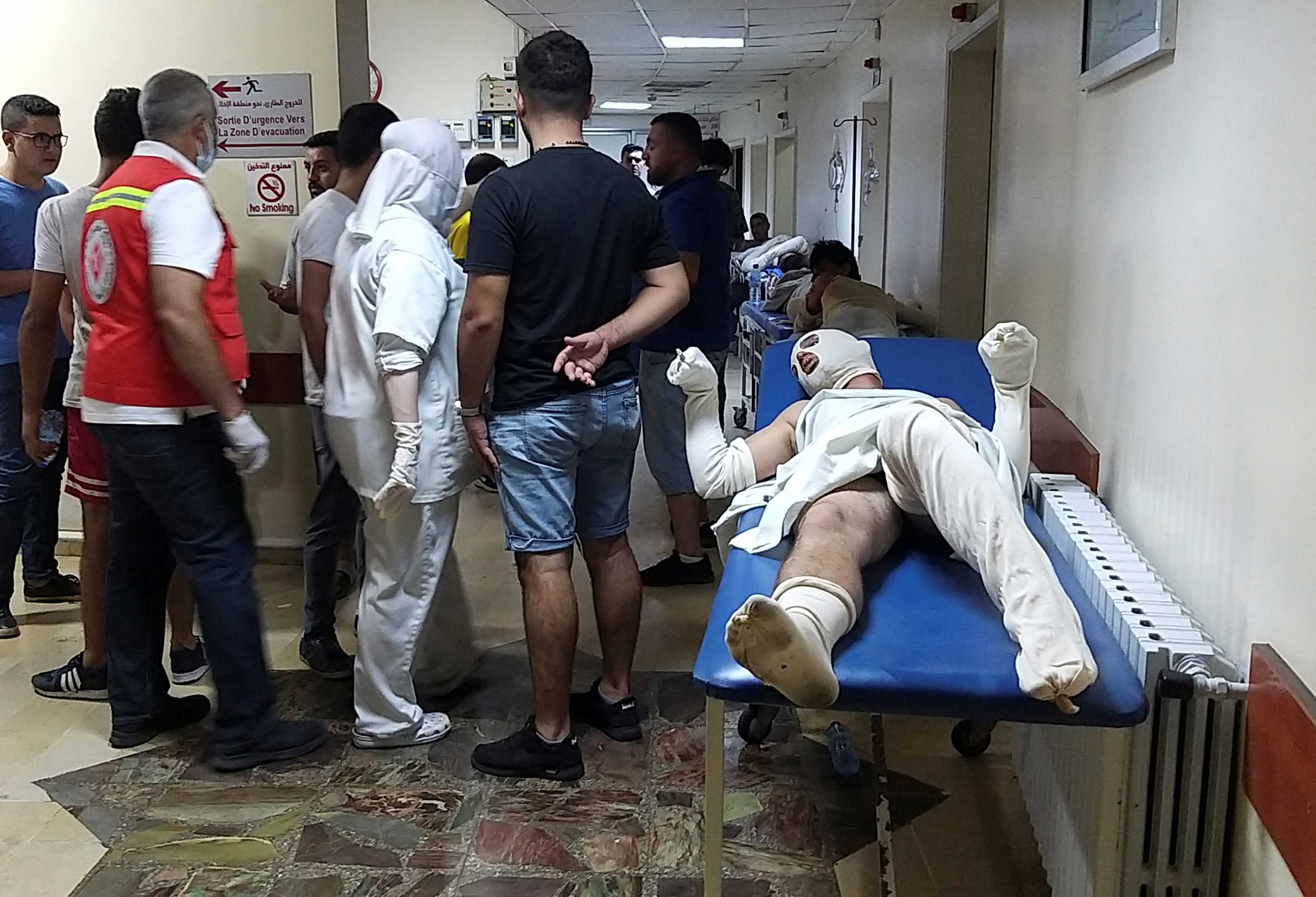 SENSITIVE MATERIAL. THIS IMAGE MAY OFFEND OR DISTURB  A person, who was injured during a fuel tanker explosion in Akkar, lies on a bed in a hospital in Tripoli, northern Lebanon August 15, 2021. REUTERS