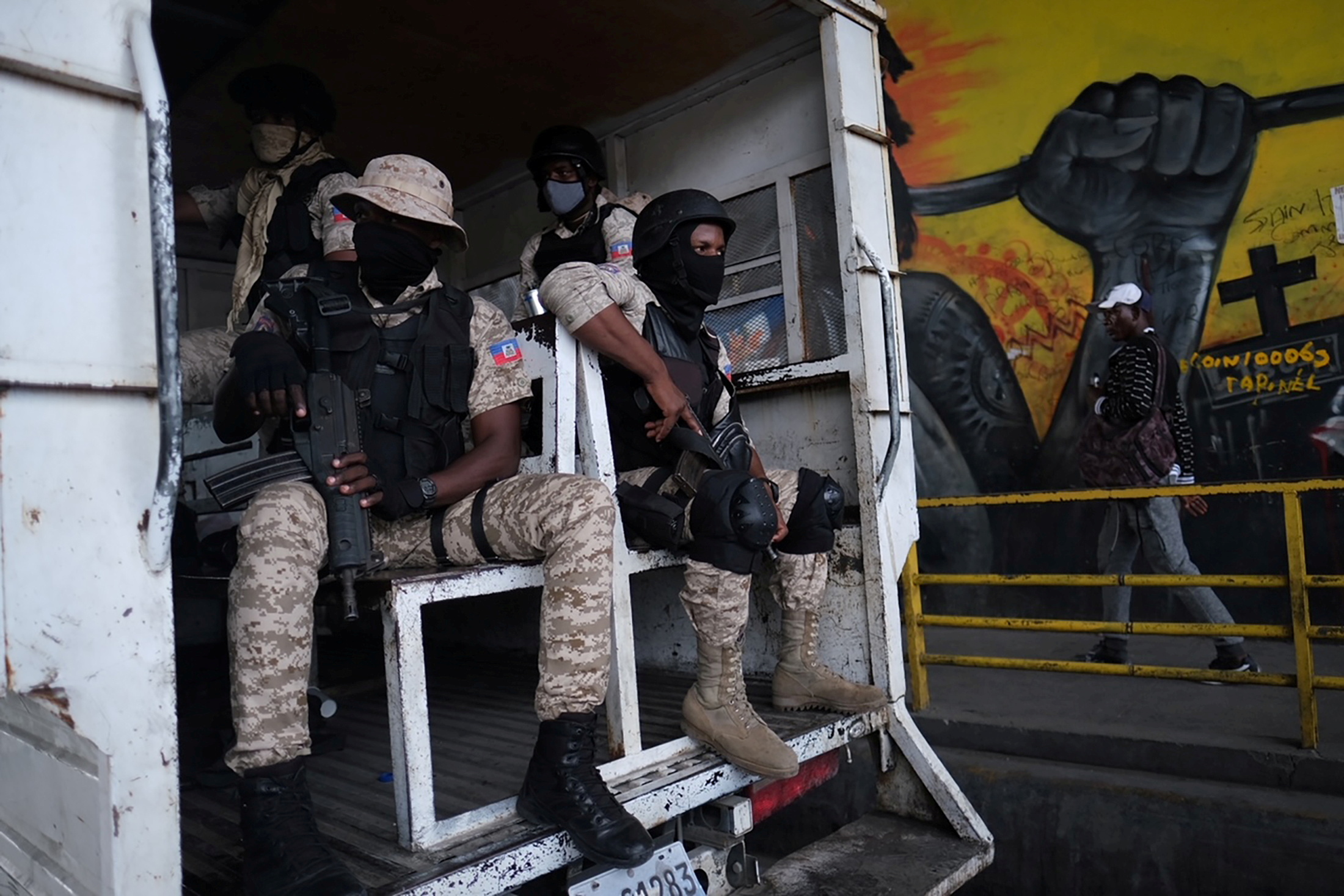 FILE PHOTO: Haitian police patrol the streets as protests were planned after the assassination of President Jovenel Moise, in Port-au-Prince, Haiti July 12, 2021. REUTERS