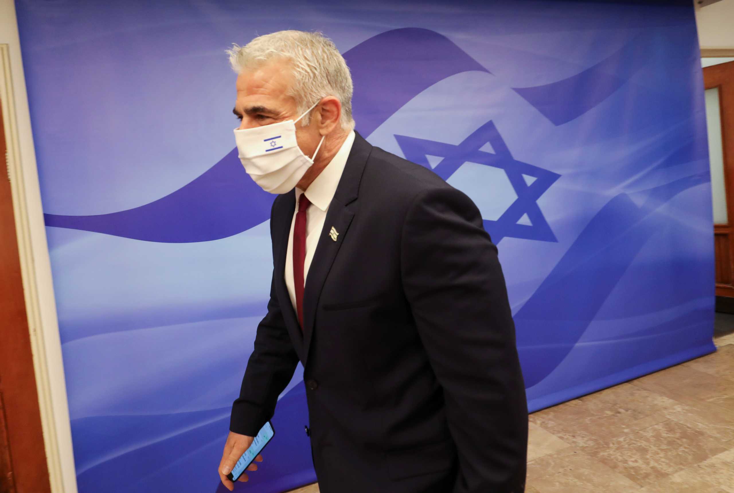 Israel's Foreign Minister Yair Lapid arrives to attend a weekly cabinet meeting at the Prime Minister's office in Jerusalem November 7, 2021. Gil Cohen-Magen