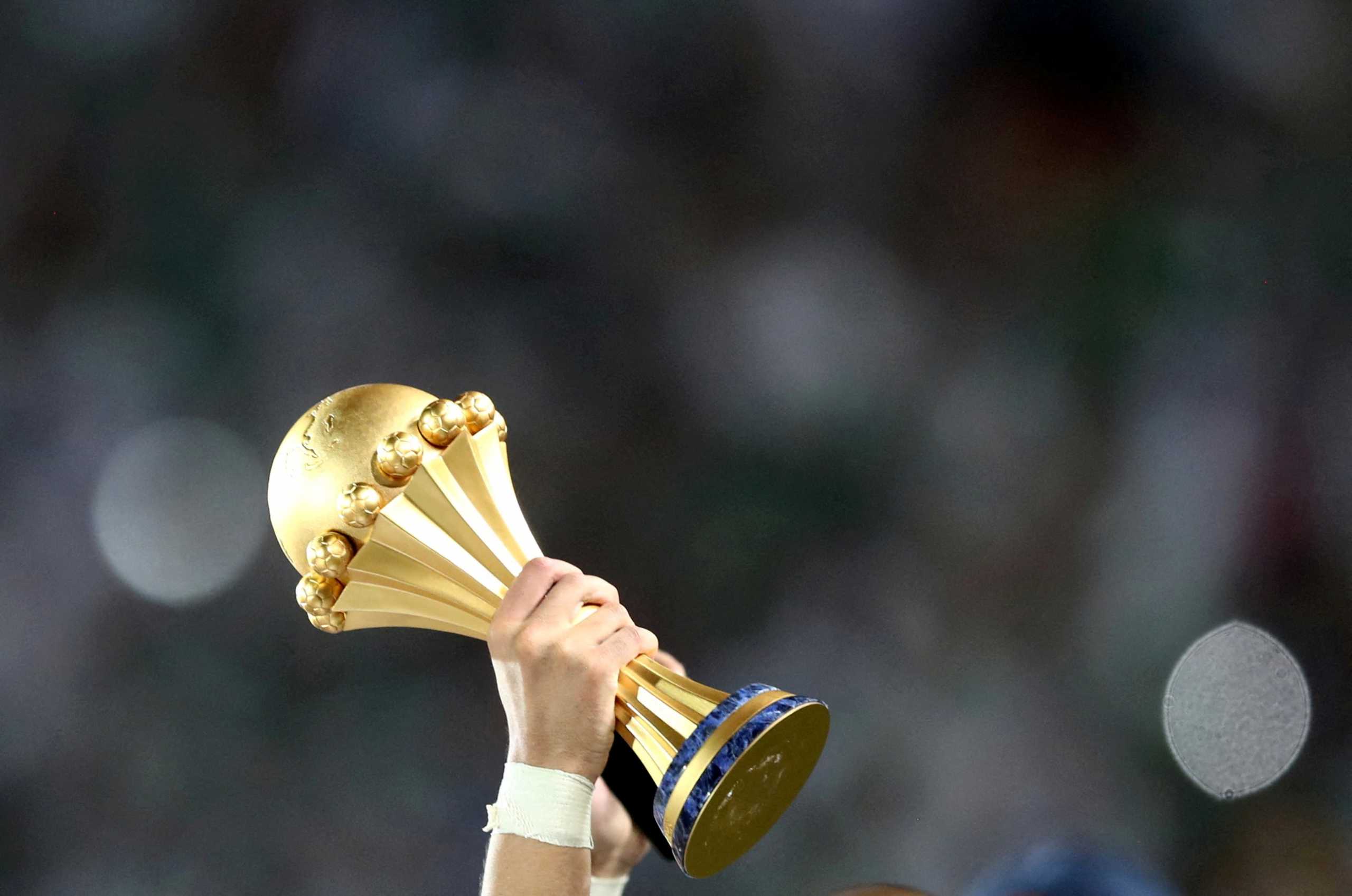 FILE PHOTO: Soccer Football - Africa Cup of Nations 2019 - Final - Senegal v Algeria - Cairo International Stadium, Cairo, Egypt - July 19, 2019    Algeria celebrate winning the Africa Cup of Nations with the trophy     REUTERS