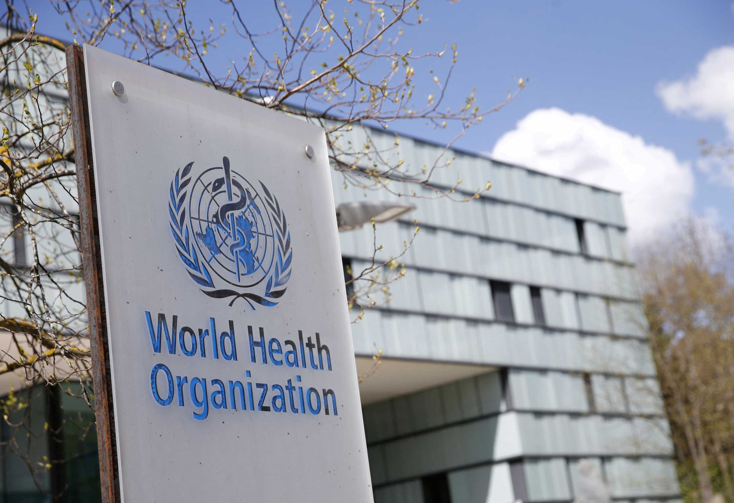 FILE PHOTO: A logo is pictured outside a building of the World Health Organization (WHO) during an executive board meeting on update on the coronavirus disease (COVID-19) outbreak, in Geneva, Switzerland, April 6, 2021. REUTERS