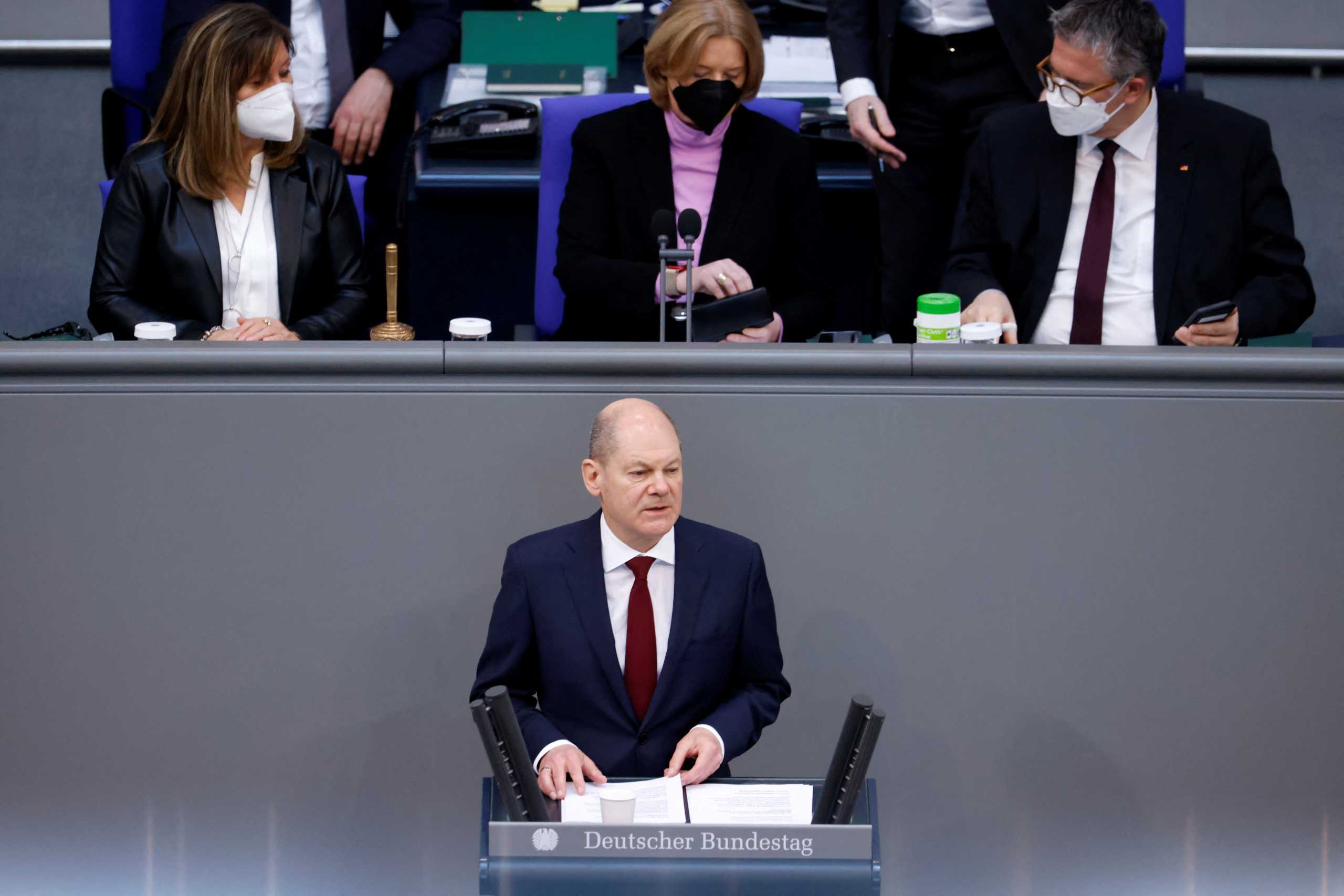 German Chancellor Olaf Scholz addresses an extraordinary session, after Russia launched a massive military operation against Ukraine, at the lower house of parliament Bundestag in Berlin, Germany, February 27, 2022. REUTERS