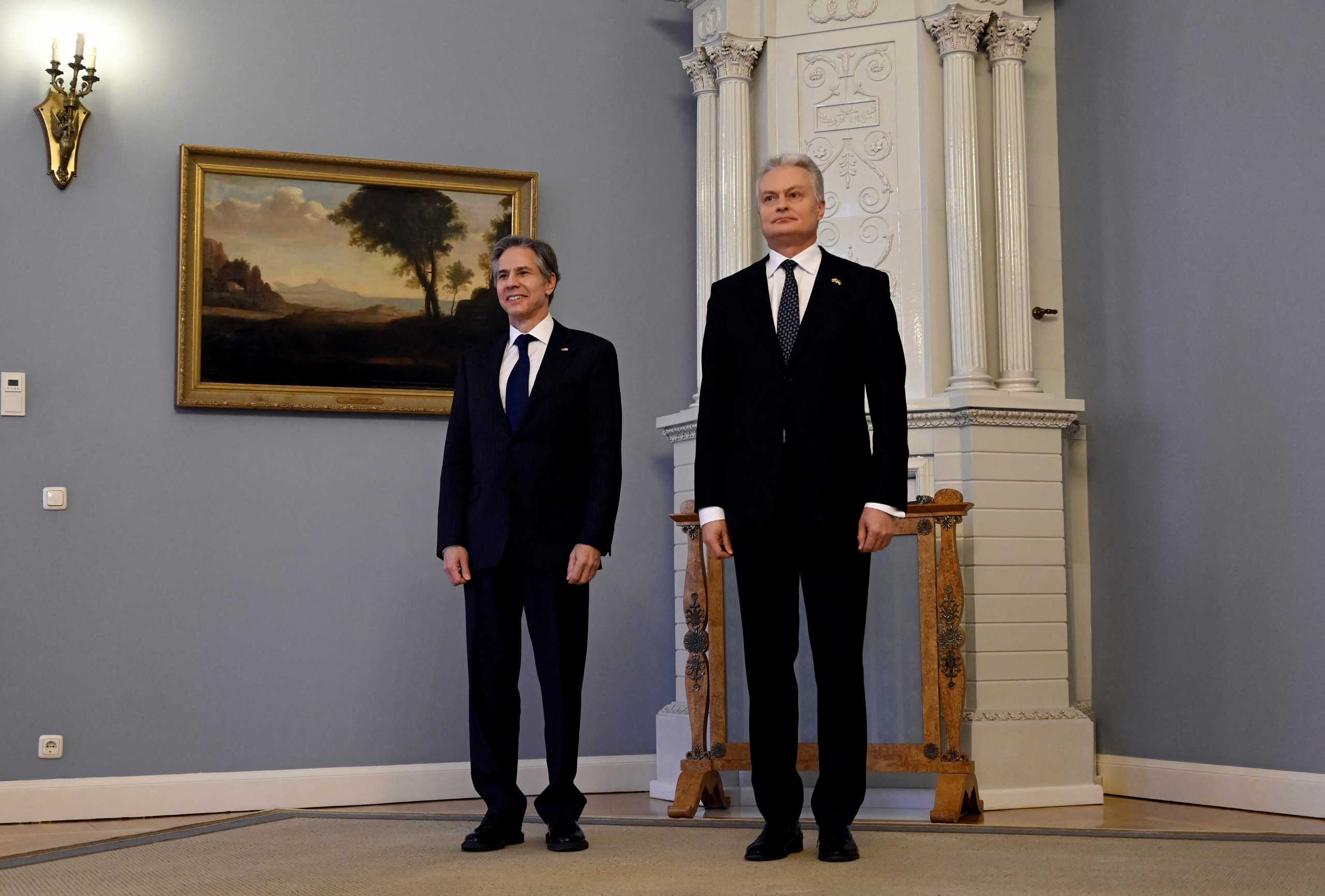 U.S. Secretary of State Antony Blinken and Lithuanian President Gitanas Nauseda stand as they meet at the "Presidentura" presidential palace in Vilnius, Lithuania March 7, 2022. Olivier Douliery