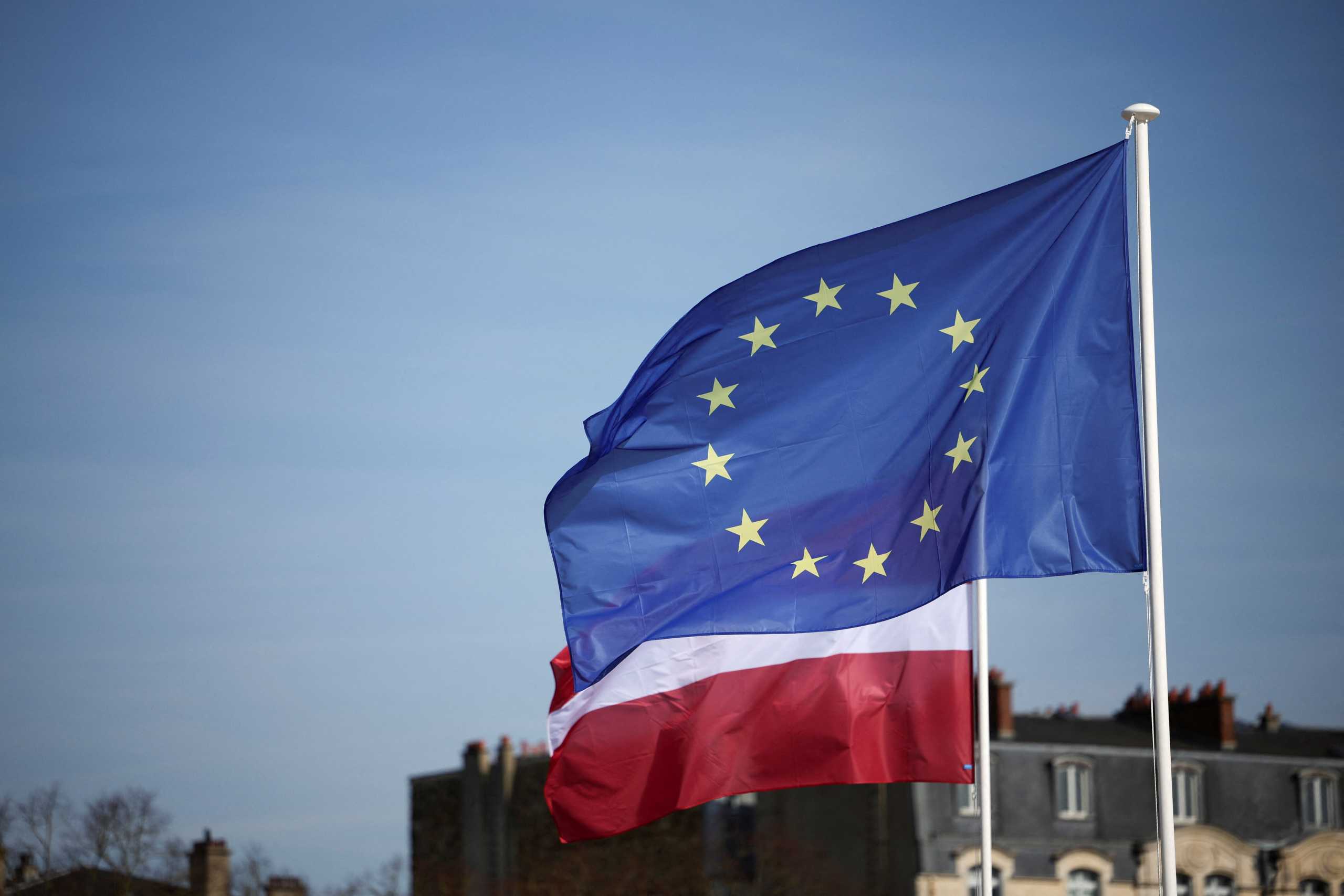 An EU flag waves, before an informal summit of EU leaders at the Chateau de Versailles (Versailles Palace) in Versailles, near Paris, March 10, 2022. REUTERS