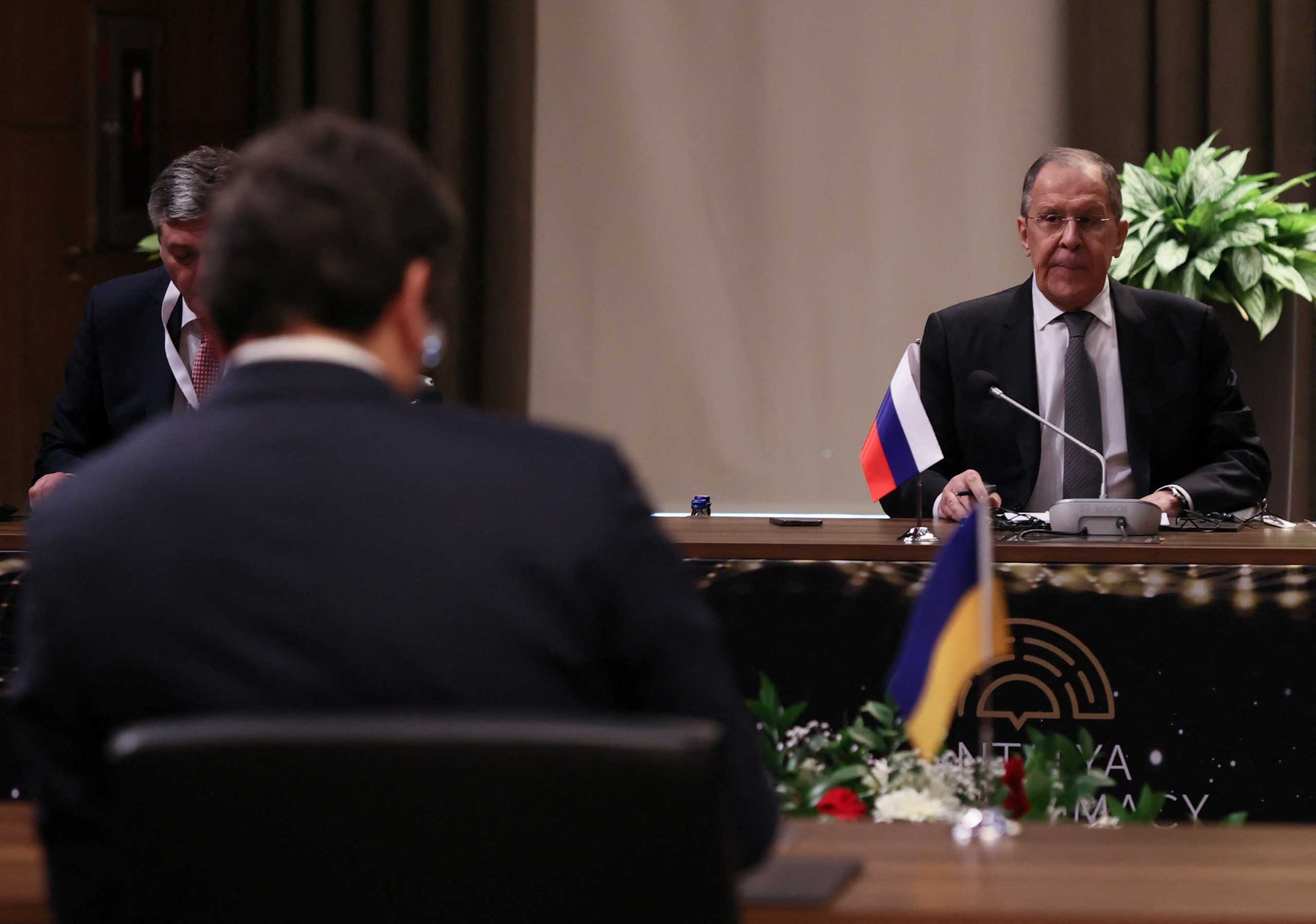 Russian Foreign Minister Sergei Lavrov, Ukrainian Foreign Minister Dmytro Kuleba and Turkish Foreign Minister Mevlut Cavusoglu (not pictured) attend their meeting in Antalya, Turkey March 10, 2022. Turkish Foreign Ministry