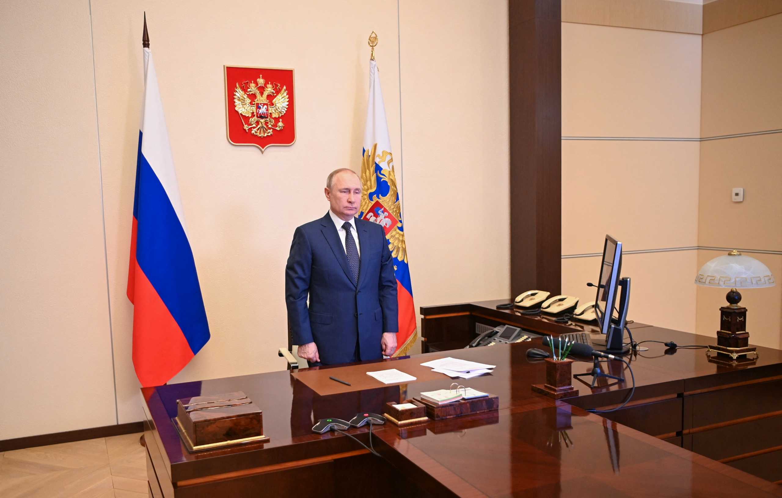 Russian President Vladimir Putin attends a flag-raising ceremony on the ferry Marshal Rokossovsky via a video link at his residence outside Moscow, Russia March 4, 2022. Sputnik