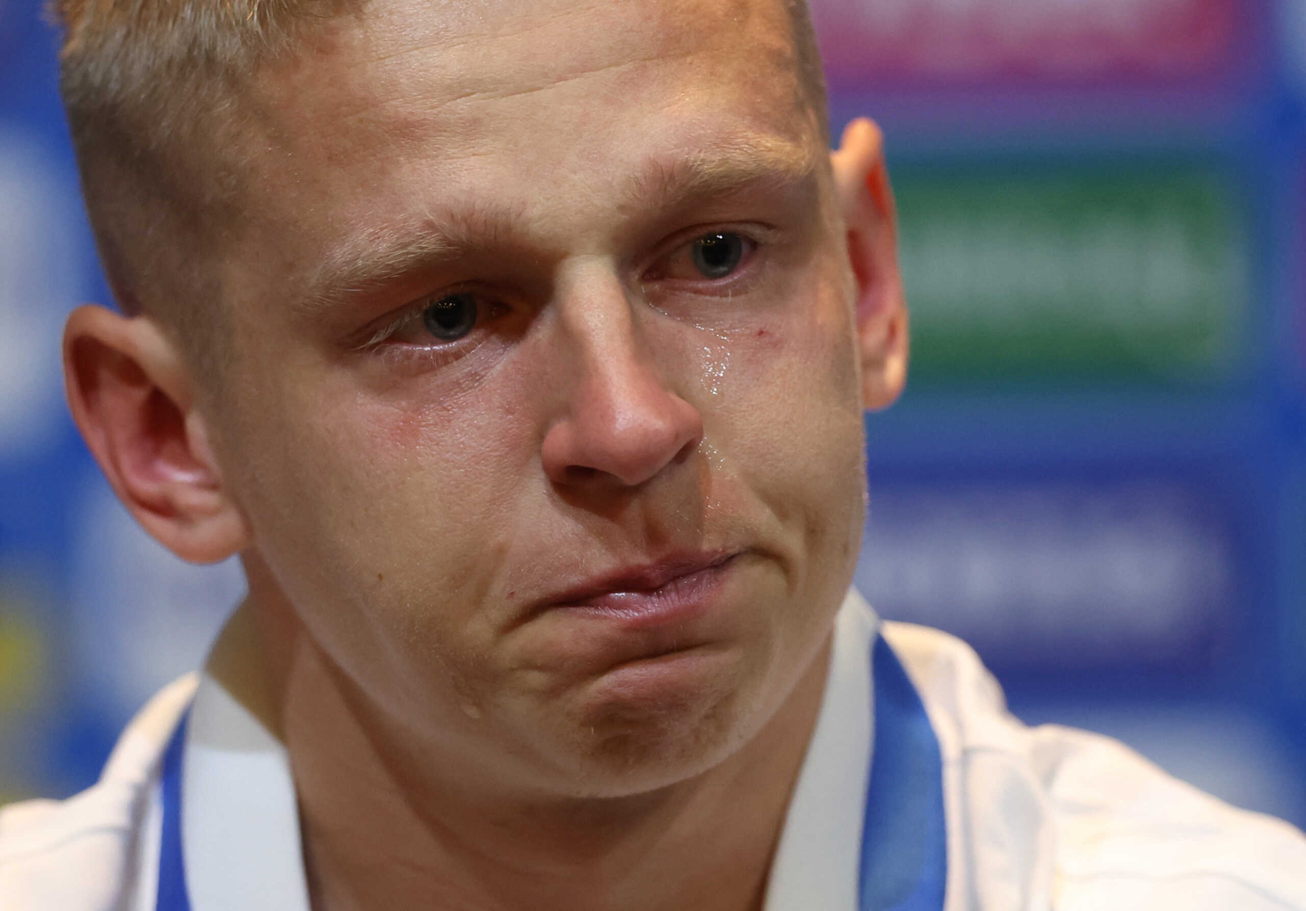 Soccer Football - FIFA World Cup - UEFA Qualifiers - Ukraine Press Conference - Hampden Park, Glasgow, Scotland, Britain - May 31, 2022 Ukraine's Oleksandr Zinchenko reacts during the press conference Action Images via Reuters