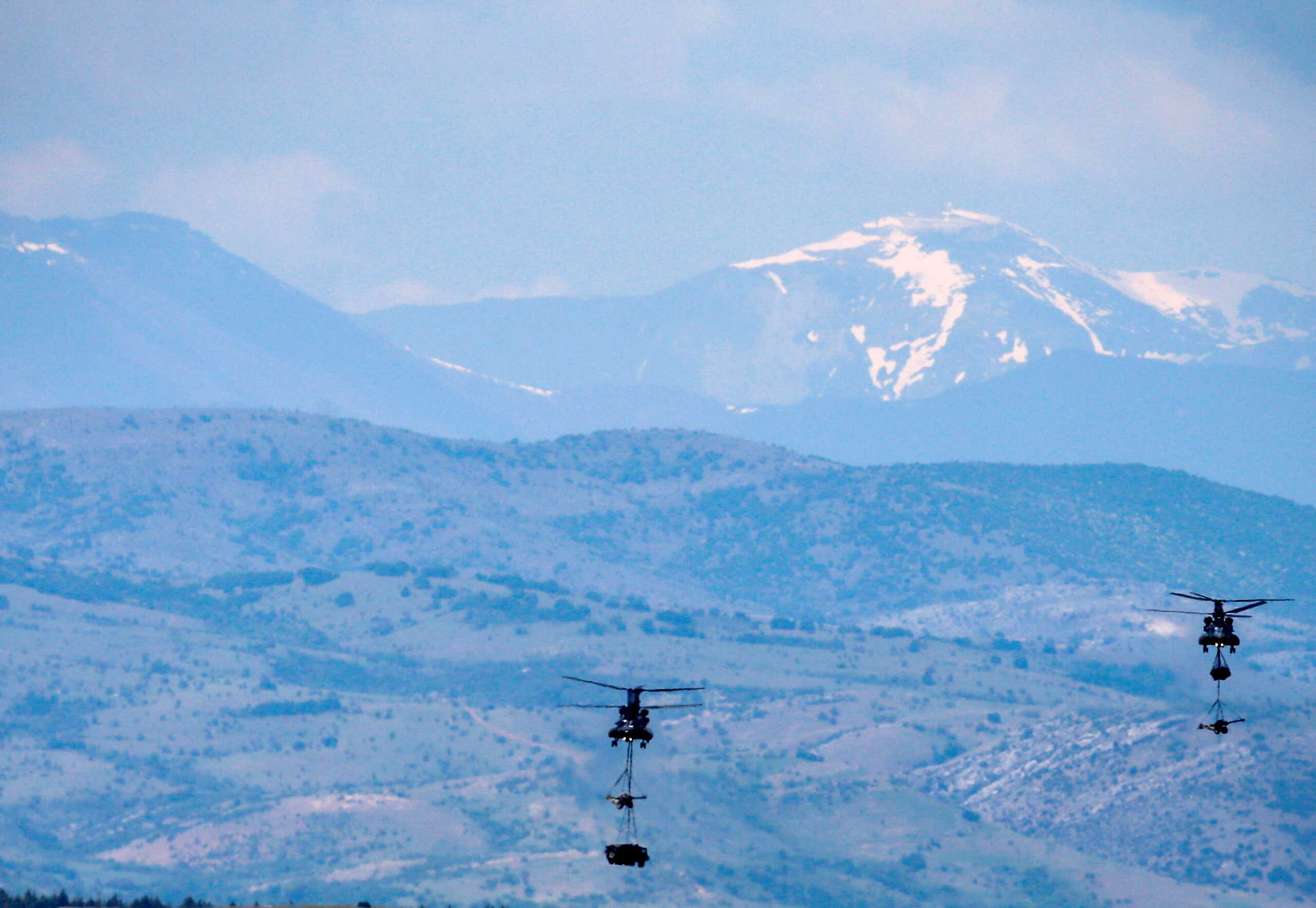 British Chinook helicopter deploy equipment as NATO allied troops carry out Swift Response 22 exercises during a media open day at Krivolak army base, North Macedonia, May 12, 2022. REUTERS