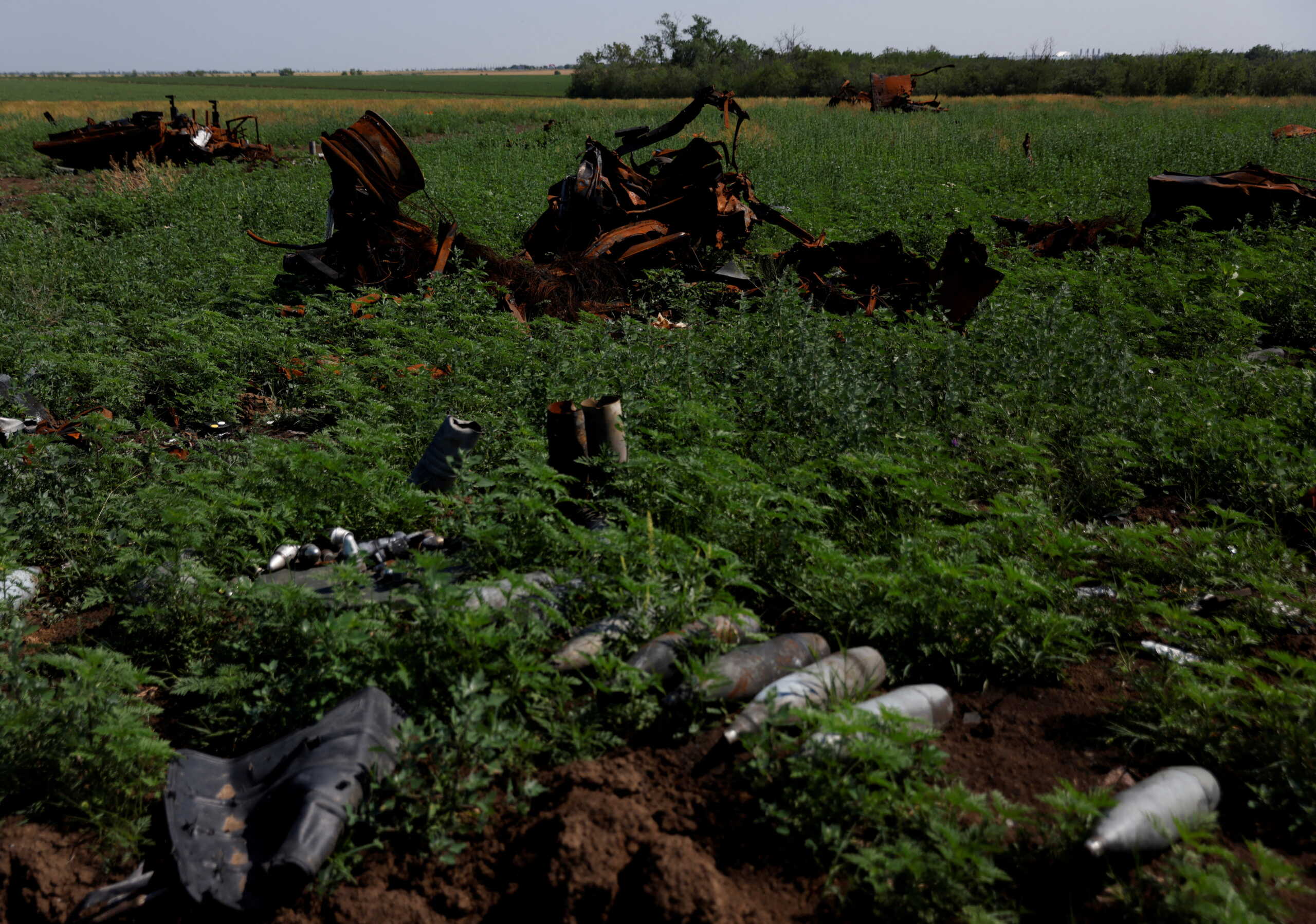 FILE PHOTO: Destroyed Russian tanks and vehicles are seen in a field, as Russia's attack on Ukraine continues, in Mykolaiv region, Ukraine June 12, 2022. REUTERS