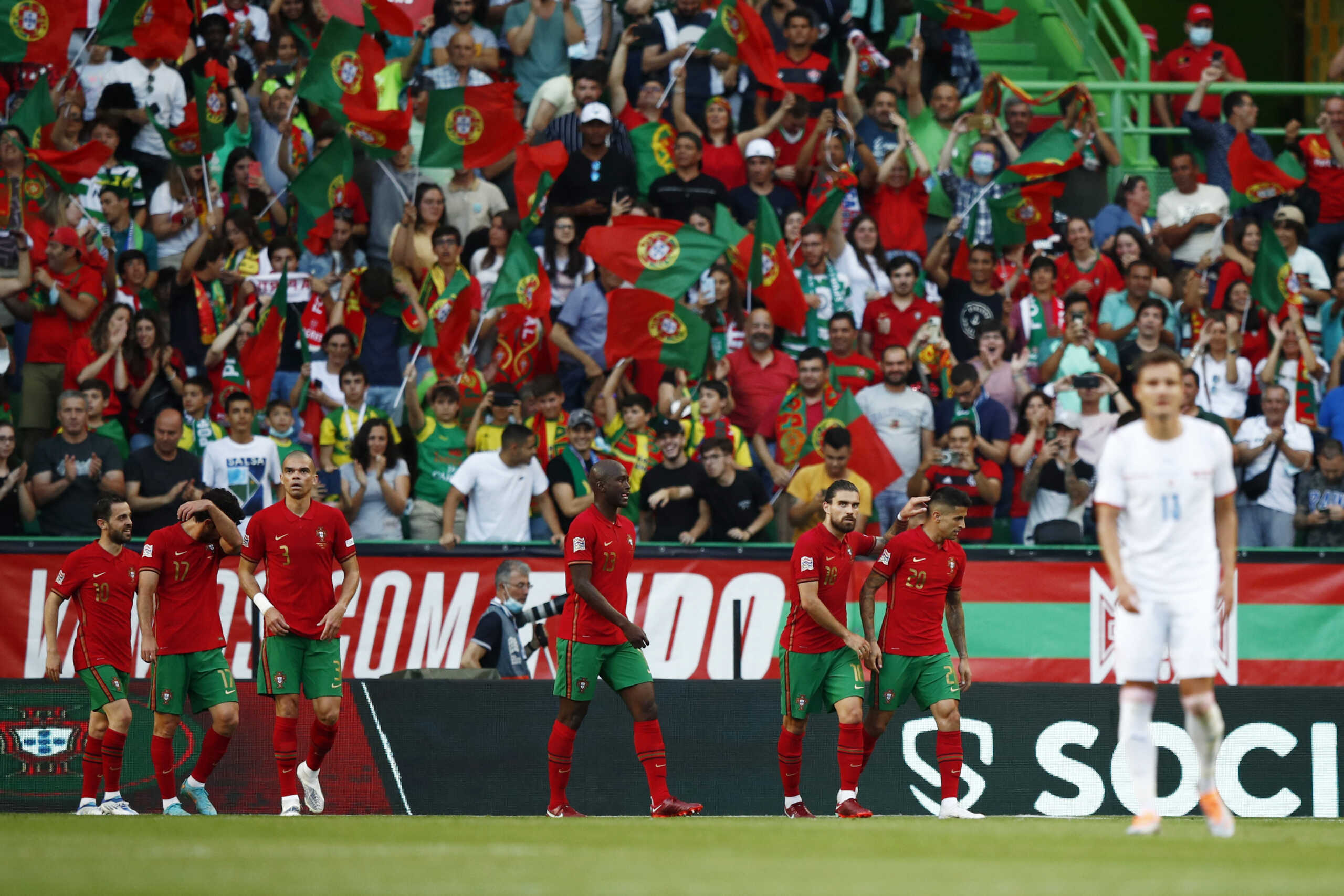 Soccer Football - UEFA Nations League - Group B - Portugal v Czech Republic - Estadio Jose Alvalade, Lisbon, Portugal - June 9, 2022 Portugal's Joao Cancelo celebrates scoring their first goal with Ruben Neves and teammates REUTERS