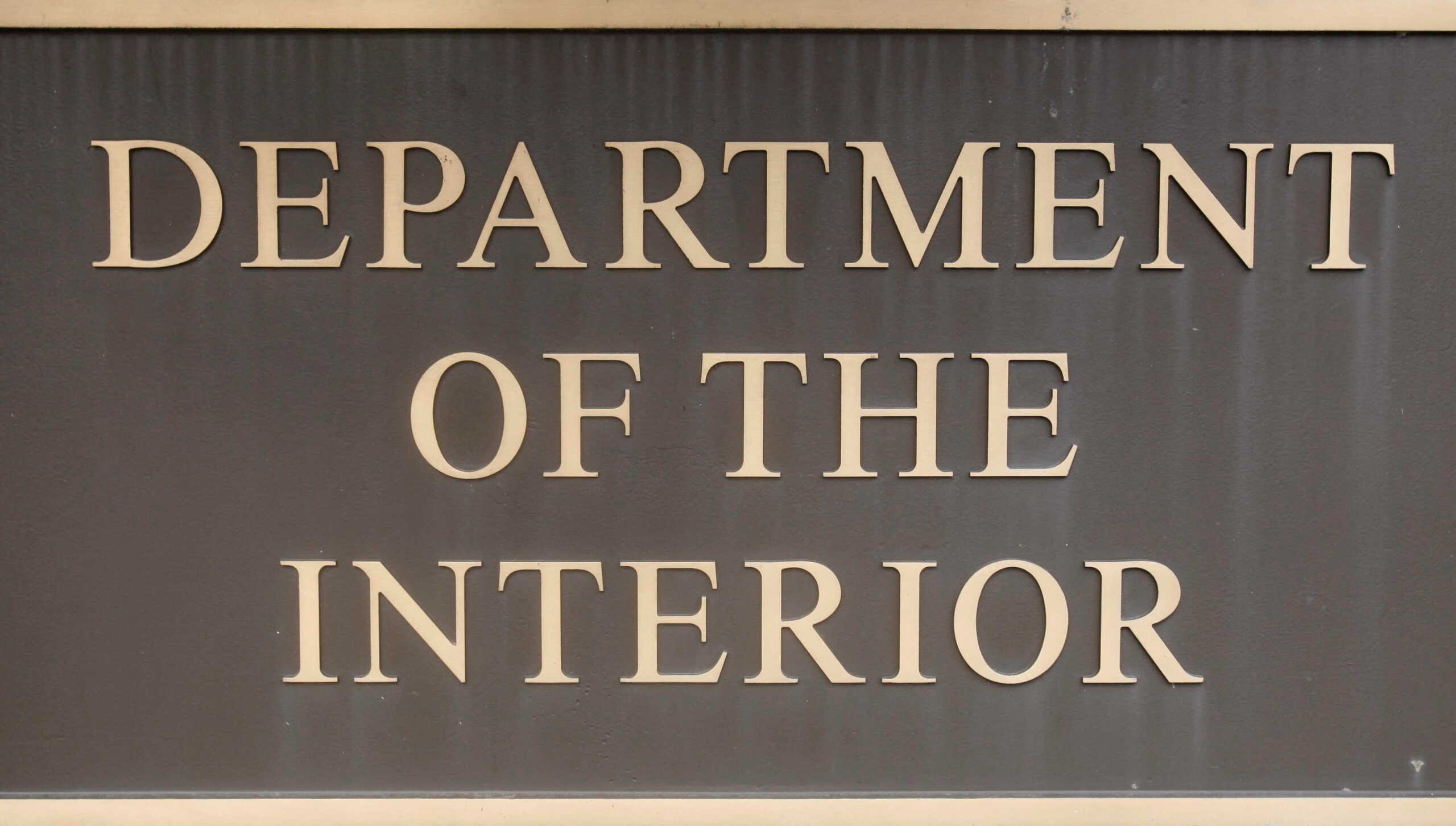 FILE PHOTO: A US. Interior Department sign is shown outside the department's headquarters in Washington, September 10, 2008. The U.S. Interior Department employees who oversaw oil drilling on federal lands had sex and used illegal drugs with workers at the energy companies they regulated, an internal government report said on Wednesday.    REUTERS