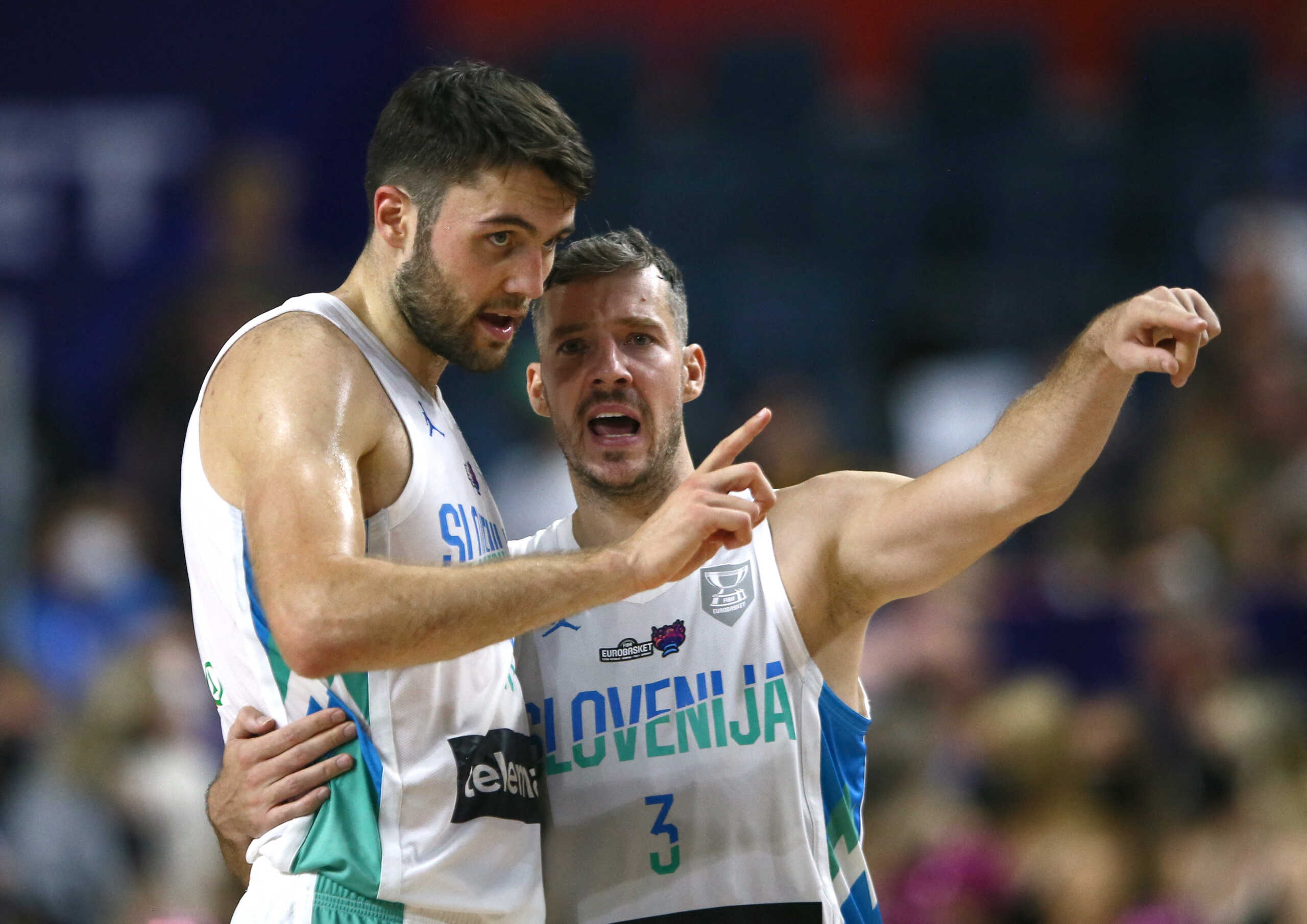 Basketball - EuroBasket Championship - Group A - Slovenia v Lithuania - Cologne Arena, Cologne, Germany- September 1, 2022 Slovenia's Mike Tobey and Goran Dragic REUTERS