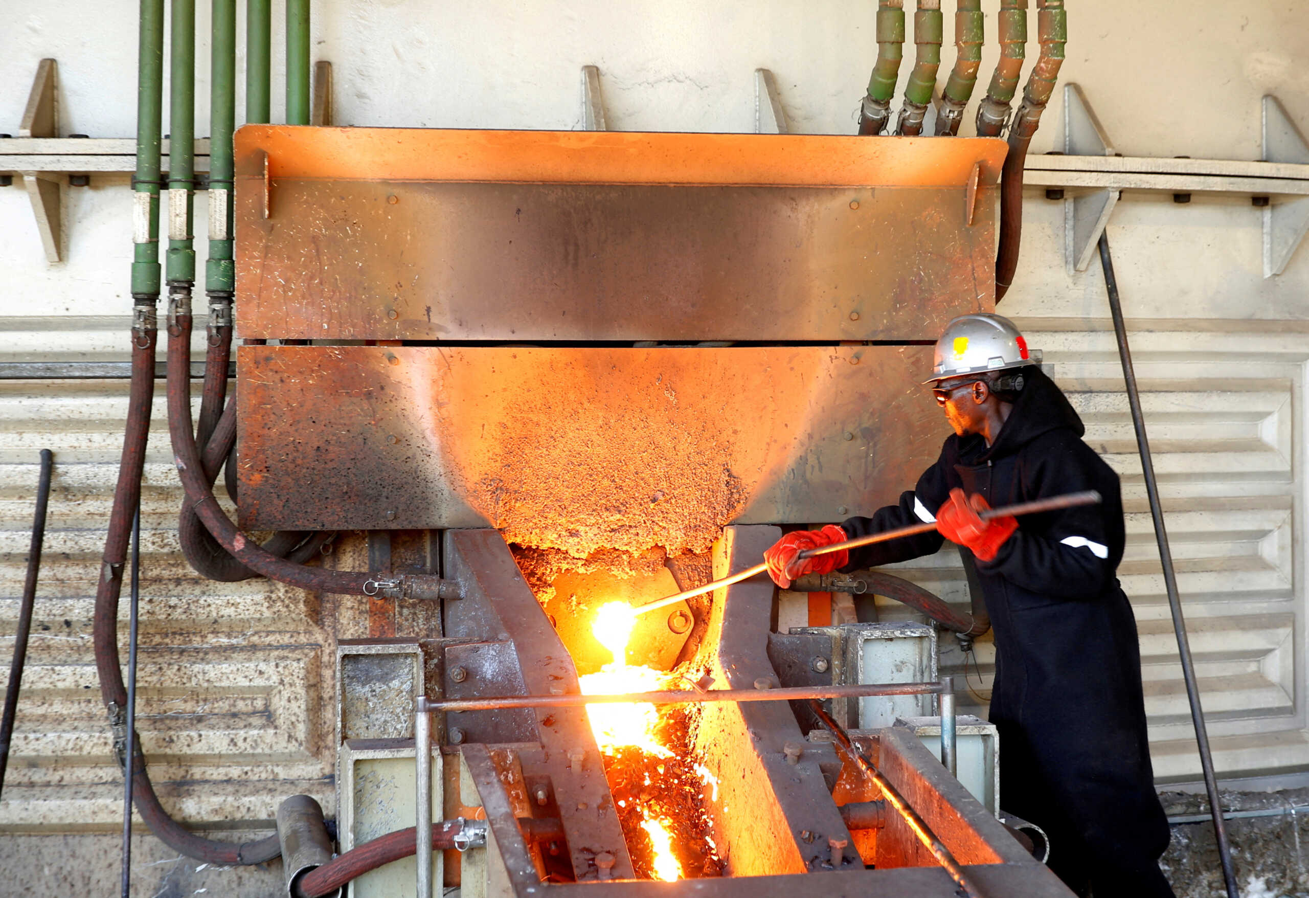 FILE PHOTO: A worker attends to machinery at a smelter plant at Anglo American Platinum's Unki mine in Shurugwi, Zimbabwe, May 16, 2019. REUTERS