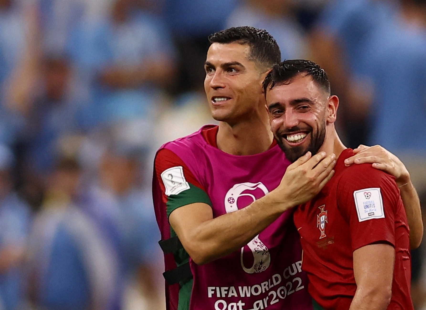 Soccer Football - FIFA World Cup Qatar 2022 - Group H - Portugal v Uruguay - Lusail Stadium, Lusail, Qatar - November 28, 2022  Portugal's Cristiano Ronaldo and Bruno Fernandes celebrate after the match REUTERS