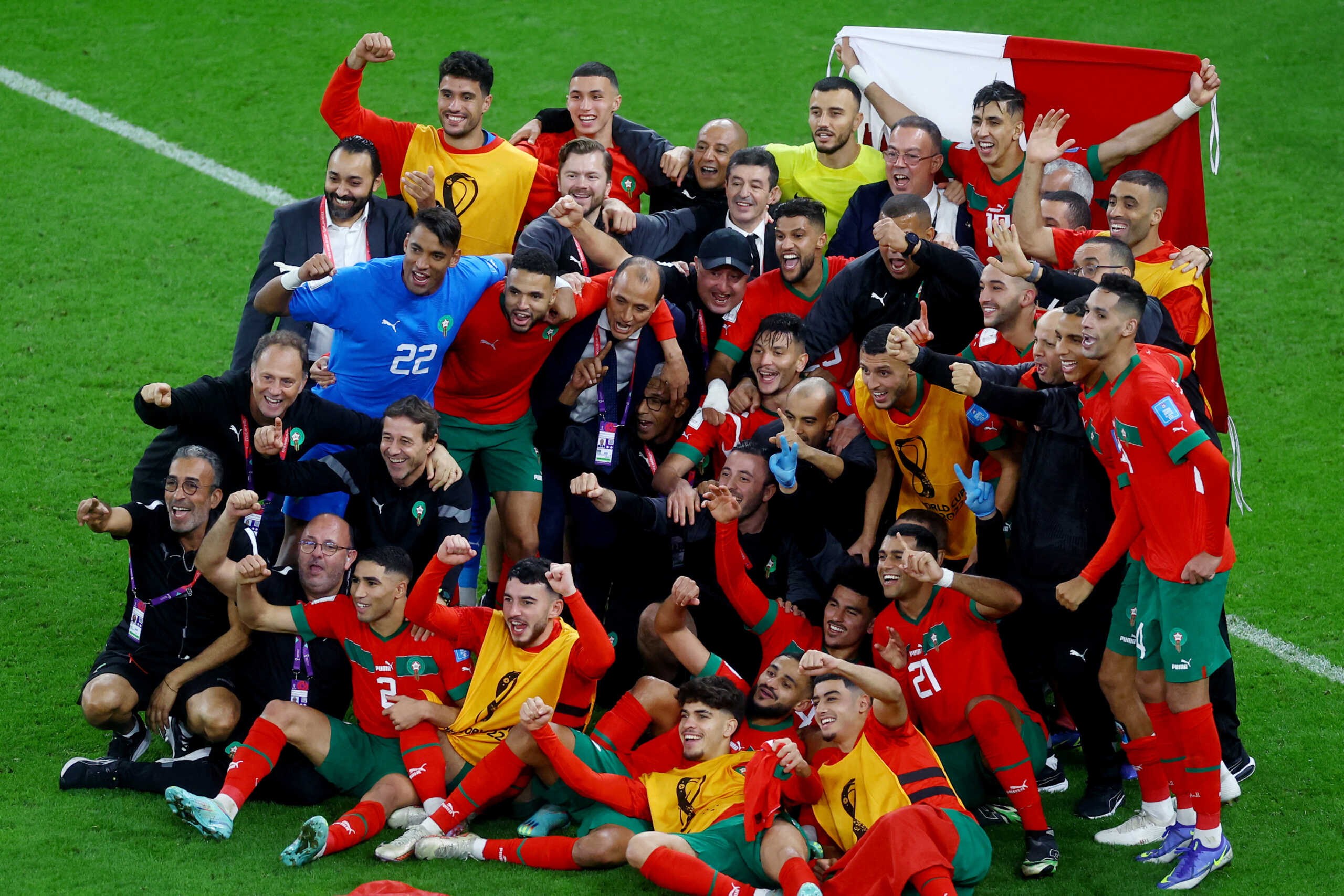 Soccer Football - FIFA World Cup Qatar 2022 - Quarter Final - Morocco v Portugal - Al Thumama Stadium, Doha, Qatar - December 10, 2022  Morocco players and staff pose for a photo after the match as Morocco progress to the semi finals REUTERS