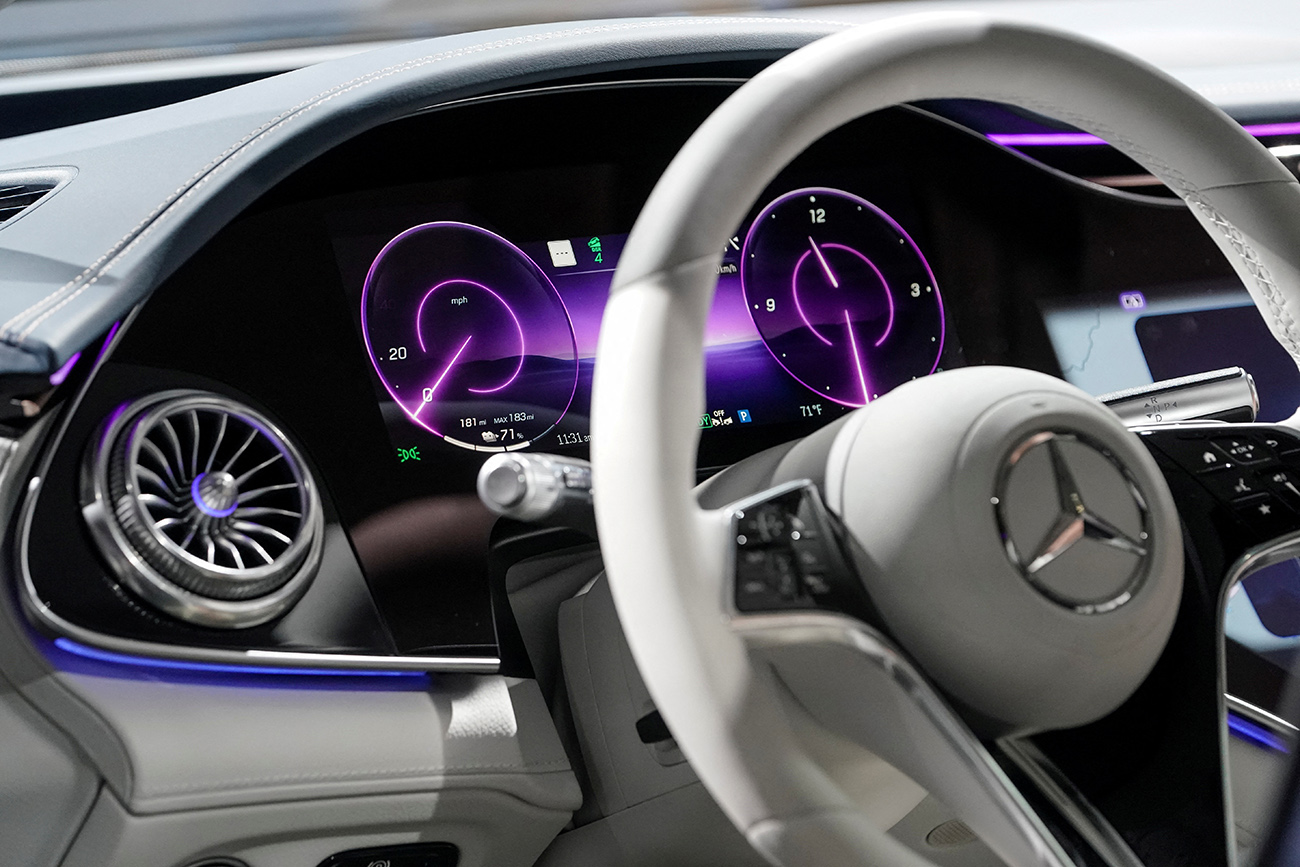 FILE PHOTO: The steering wheel and one of the digital dashboards of the all-electric Mercedes-Benz EQS SUV, one of the Mercedes EV models being sold in Japan,  is seen at the opening of a Mercedes-Benz electric vehicle Battery Factory in  Woodstock, Alabama, U.S., March 15, 2022. REUTERS