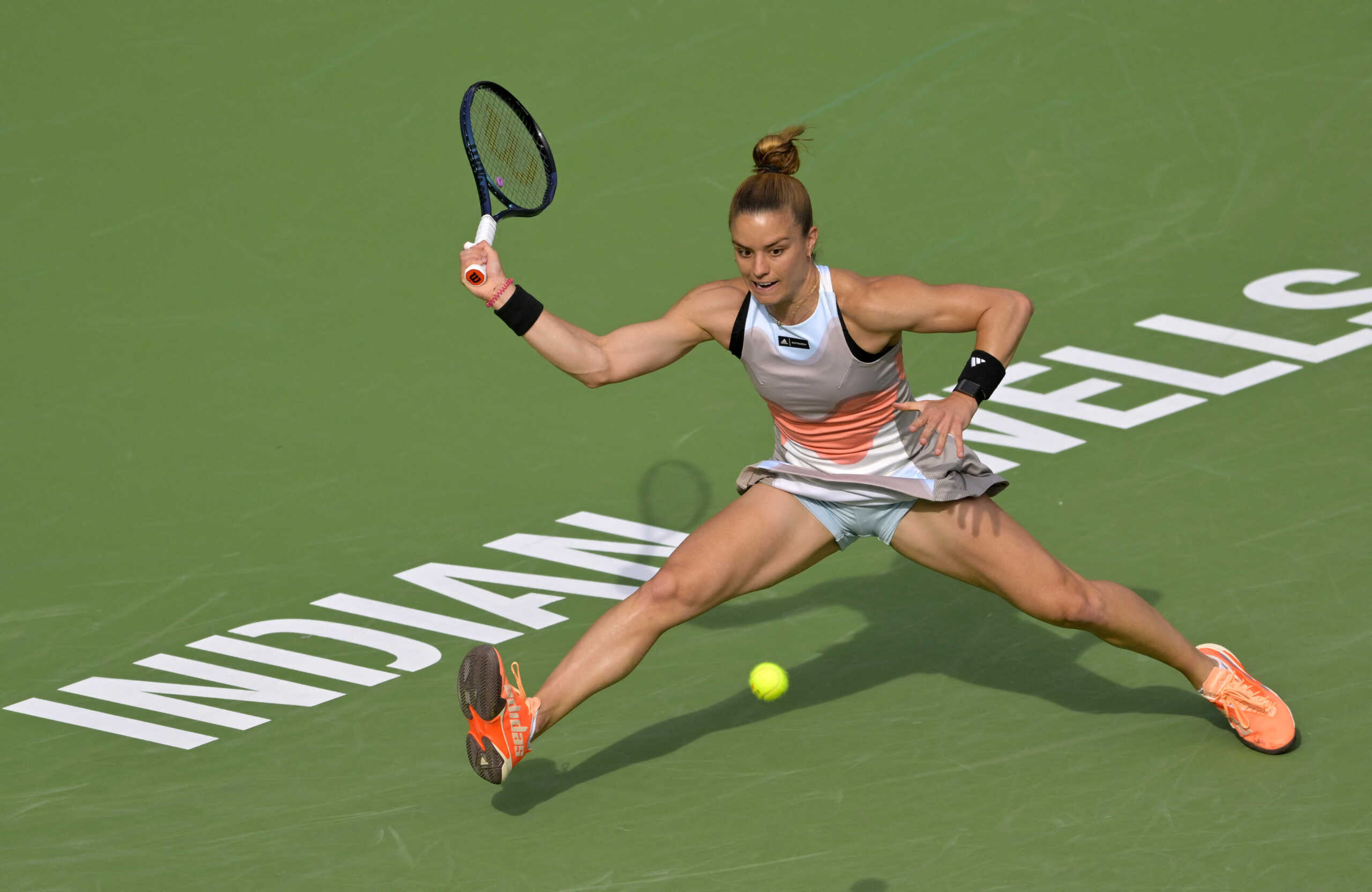 Mar 17, 2023; Indian Wells, CA, USA; Maria Sakkari (GRE) hits a shot against Aryna Sabalenka in the semi finals of the BNP Paribas Open at the Indian Wells Tennis Garden. Mandatory Credit: Jayne Kamin-Oncea-USA TODAY Sports