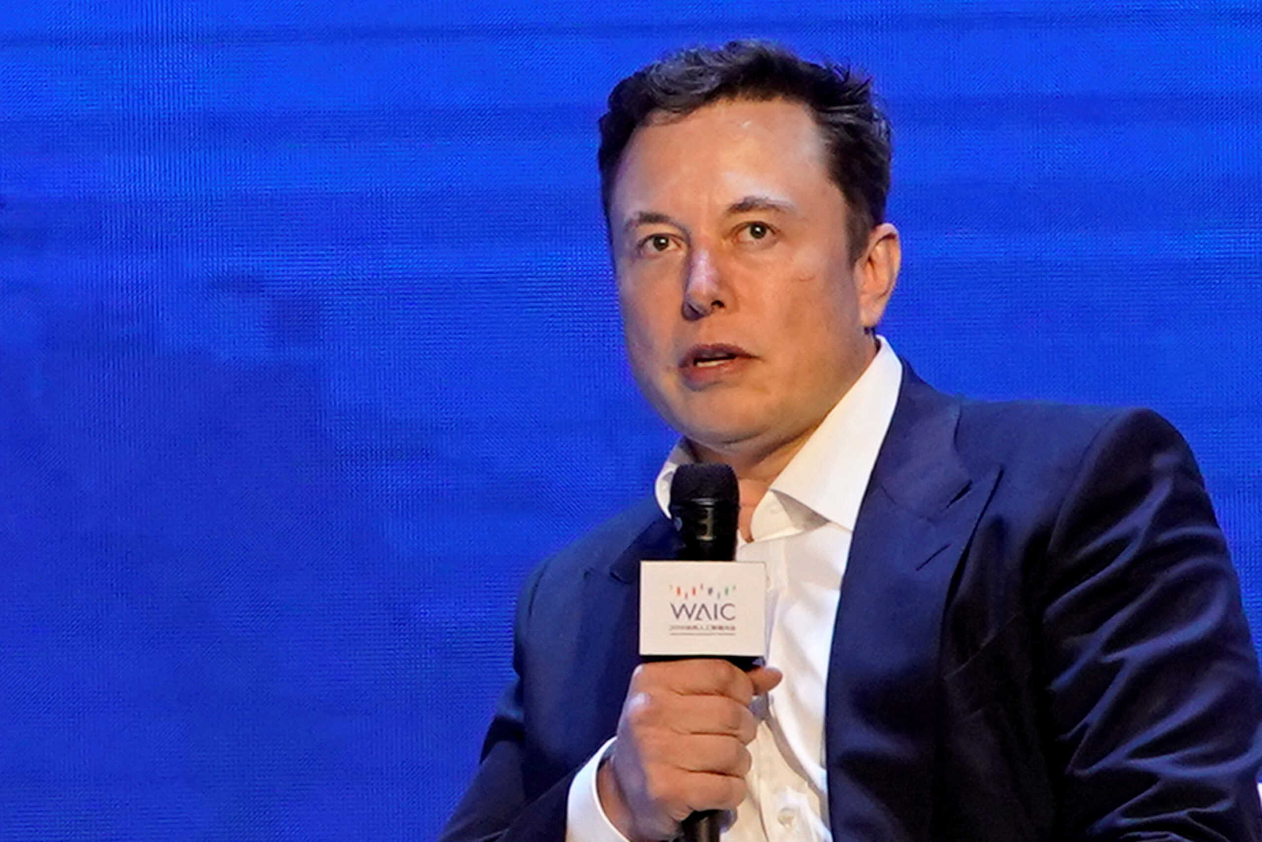 FILE PHOTO: FILE PHOTO: Tesla Inc CEO Elon Musk attends the World Artificial Intelligence Conference (WAIC) in Shanghai, China August 29, 2019. REUTERS