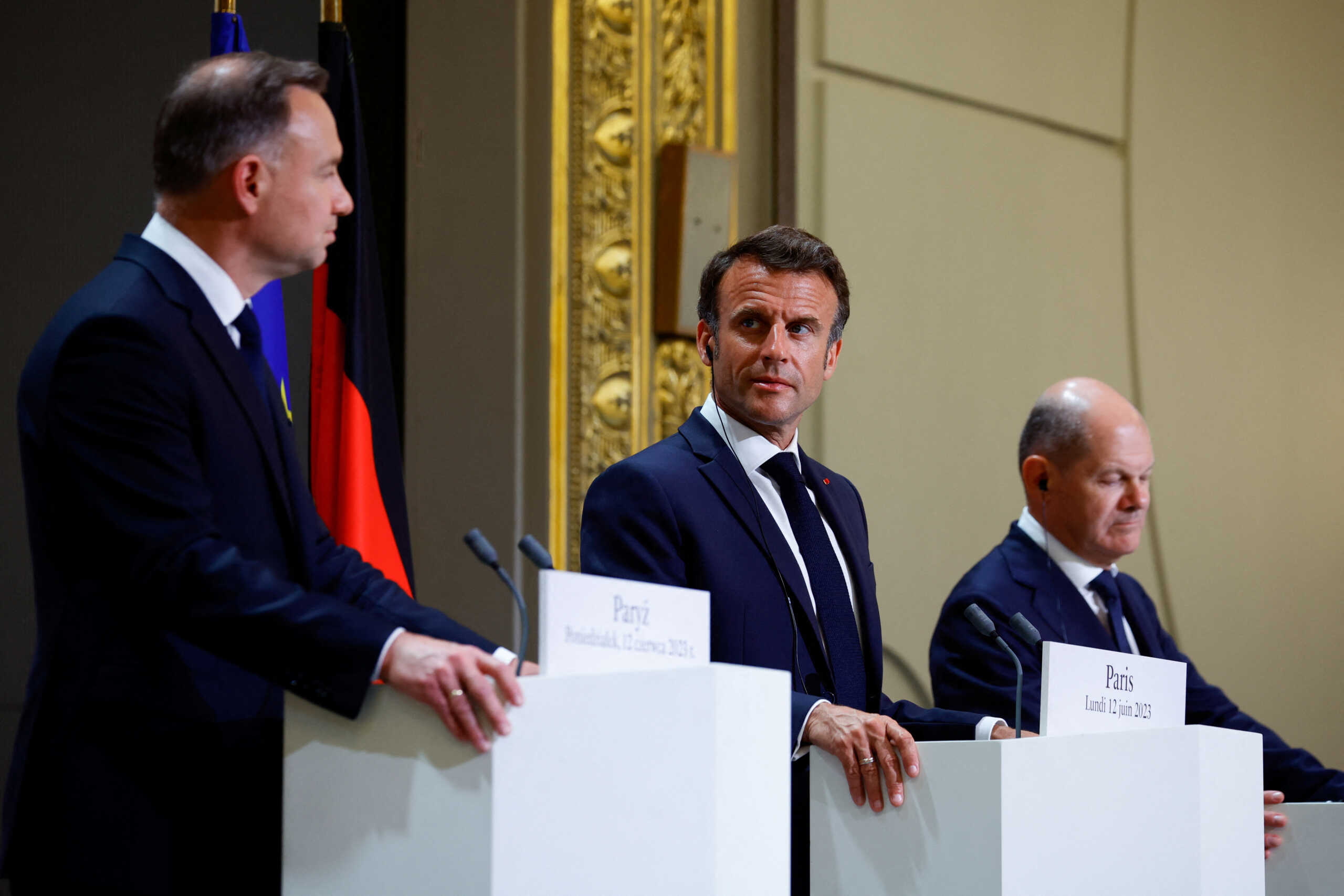 French President Emmanuel Macron, German Chancellor Olaf Scholz and Polish President Andrzej Duda attend a joint press conference during the Weimar Triangle Summit at the Elysee Palace in Paris, France, June 12, 2023. REUTERS