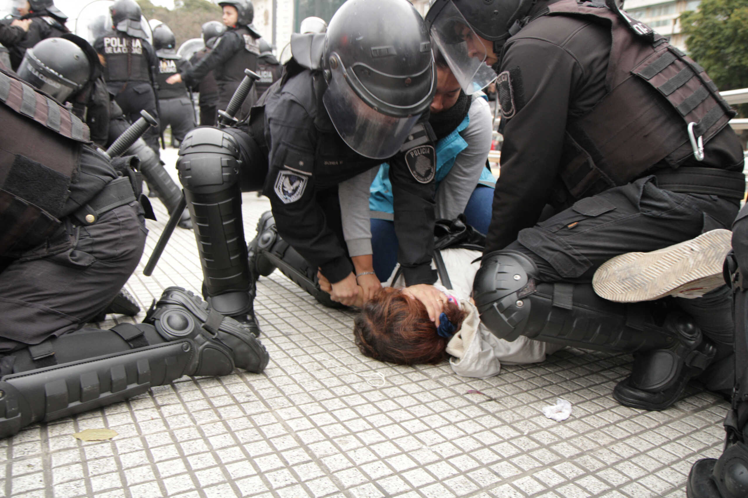 Police officers detain a woman during a protest against the upcoming presidential elections, in Buenos Aires, Argentina August 10, 2023. Susi Maresca