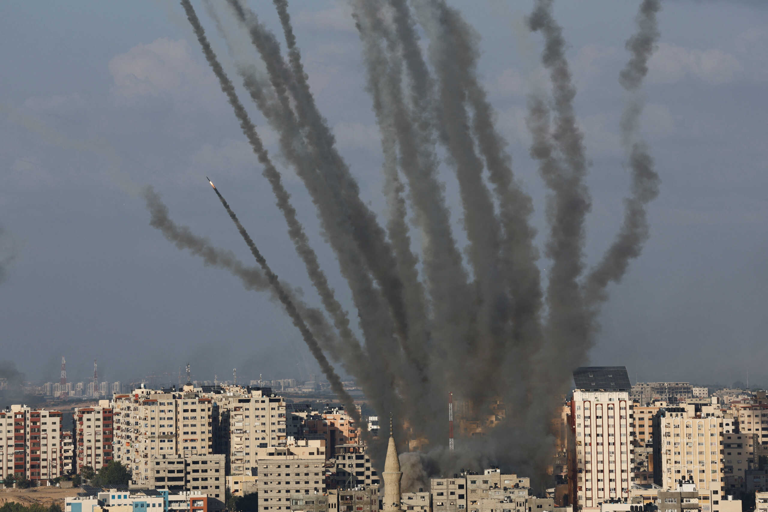 Rockets are fired from Gaza towards Israel, in Gaza, October 10, 2023. REUTERS