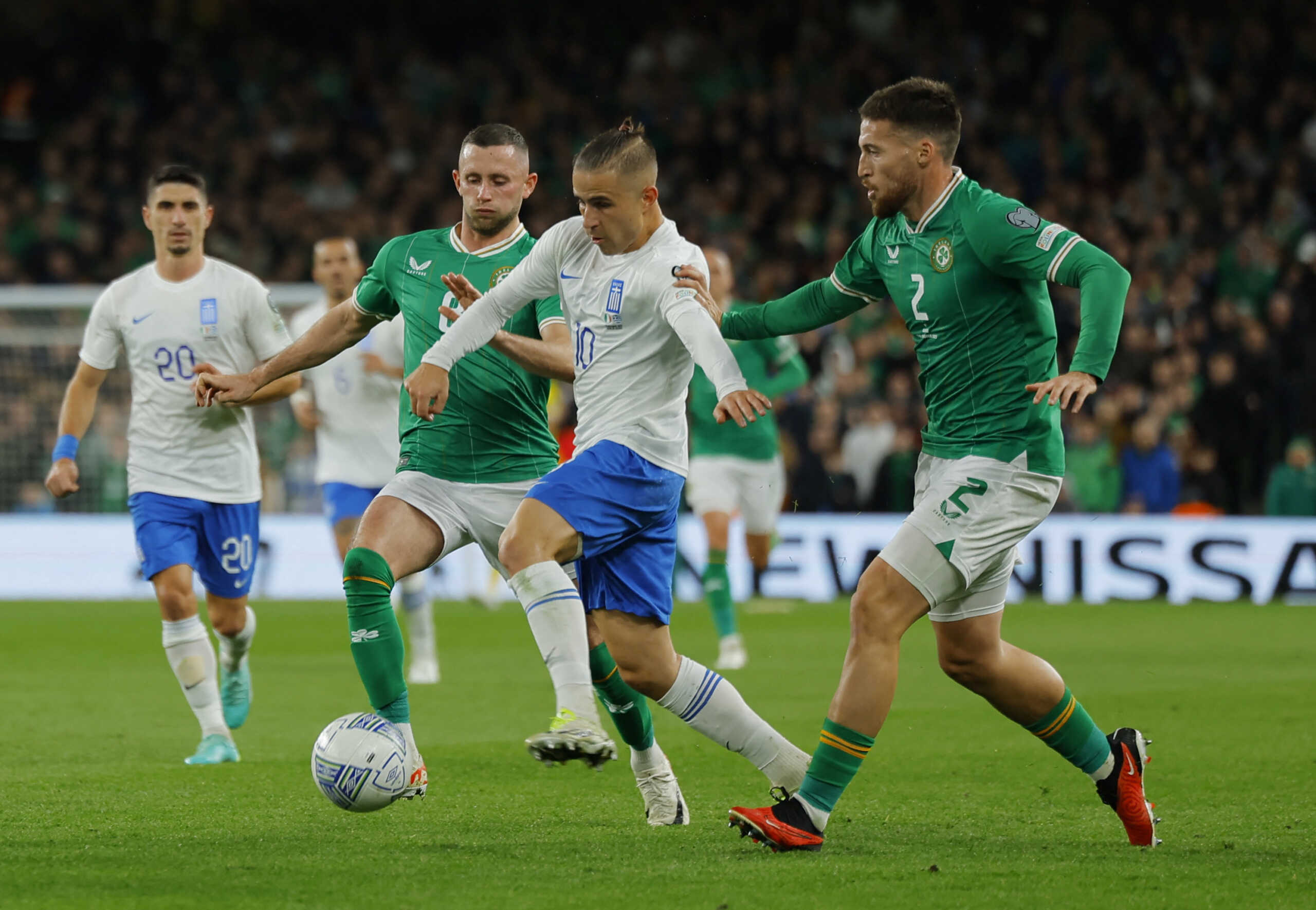 Soccer Football - Euro 2024 Qualifier - Group B - Republic of Ireland v Greece - Aviva Stadium, Dublin, Ireland - October 13, 2023 Greece's Dimitris Pelkas in action with Republic of Ireland's Alan Browne and Matt Doherty REUTERS