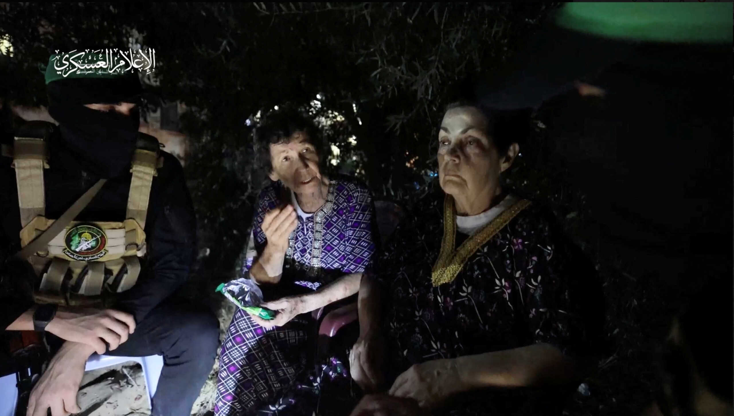 Yocheved Lifshitz and Nurit Cooper (also known as Nurit Yitzhak) who were held hostages by Palestinian Hamas militants, are released by the militants, in this video screengrab obtained by Reuters on October 23, 2023.  Al-Qassam Brigades, military wing of Hamas