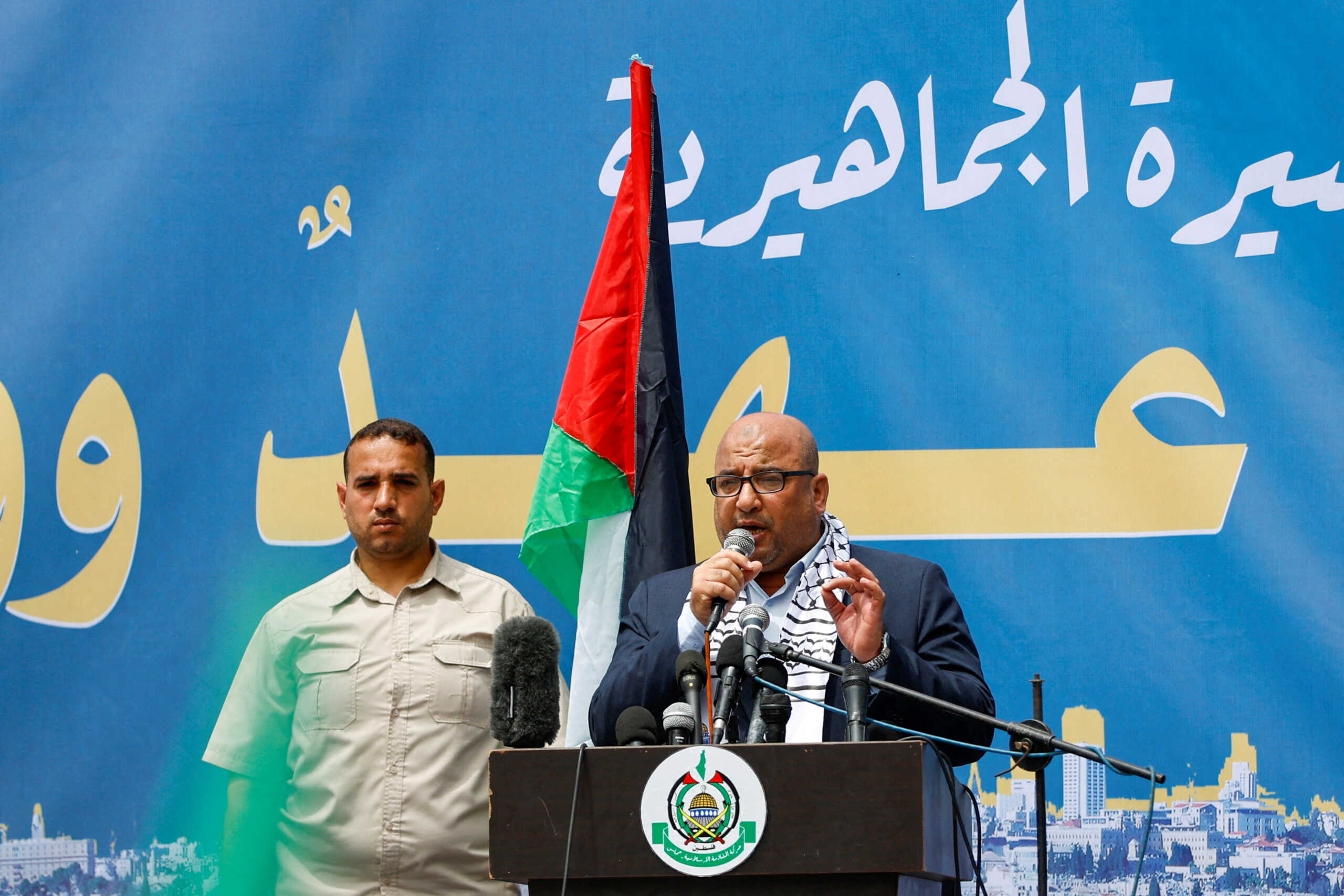 FILE PHOTO: Zakaria Abu Maamar, a member of Hamas, speaks as Palestinian Hamas supporters attend a rally against visits by Israeli right wing groups to Al-Aqsa mosque, in Khan Younis in the southern Gaza Strip May 26, 2023.  REUTERS