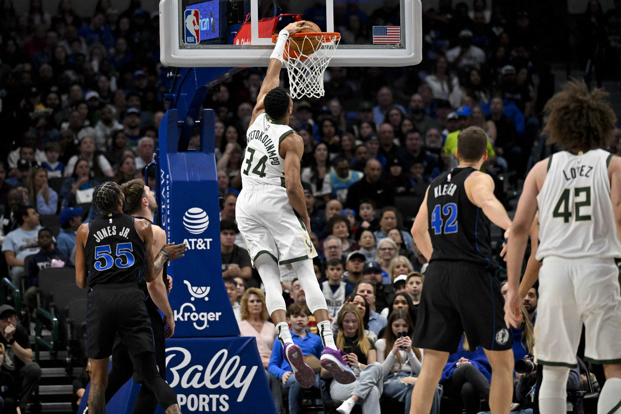 Feb 3, 2024; Dallas, Texas, USA; Milwaukee Bucks forward Giannis Antetokounmpo (34) dunks the ball against the Dallas Mavericks during the first quarter at the American Airlines Center. Mandatory Credit: Jerome Miron-USA TODAY Sports