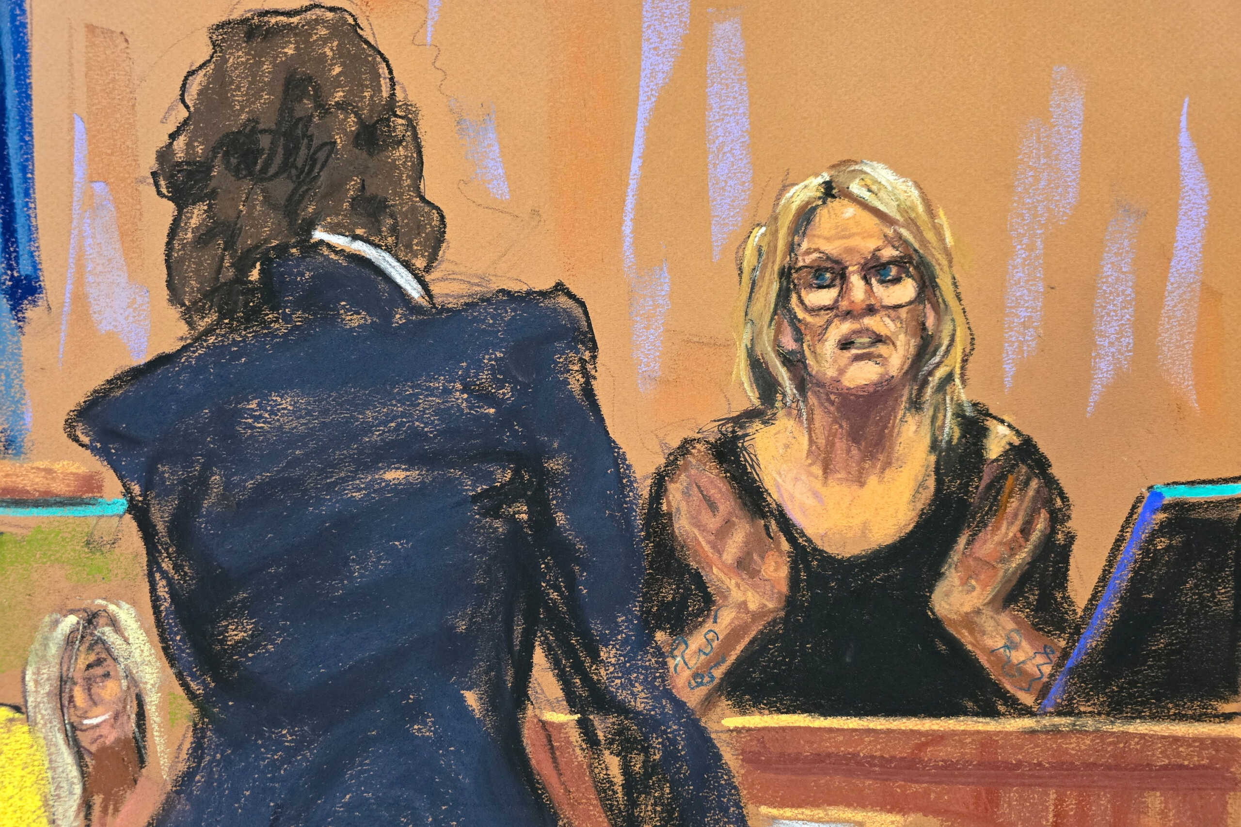 Stormy Daniels is questioned by prosecutor Susan Hoffinger during former U.S. President Donald Trump's criminal trial on charges that he falsified business records to conceal money paid to silence porn star Stormy Daniels in 2016, in Manhattan state court in New York City, U.S. May 7, 2024 in this courtroom sketch. REUTERS