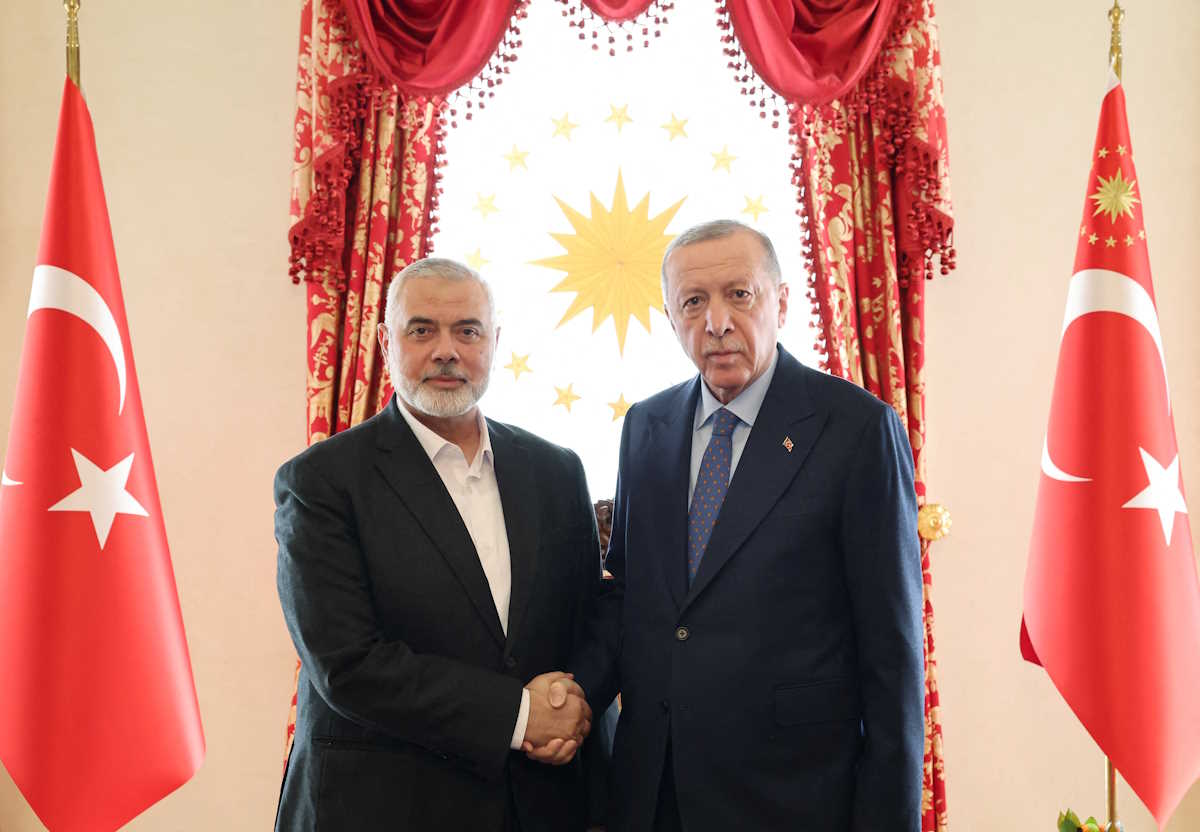 Turkey's President Tayyip Erdogan meets with Ismail Haniyeh, leader of the Palestinian Islamist group Hamas, in Istanbul, Turkey, April 20, 2024. Murat Cetinmuhurdar