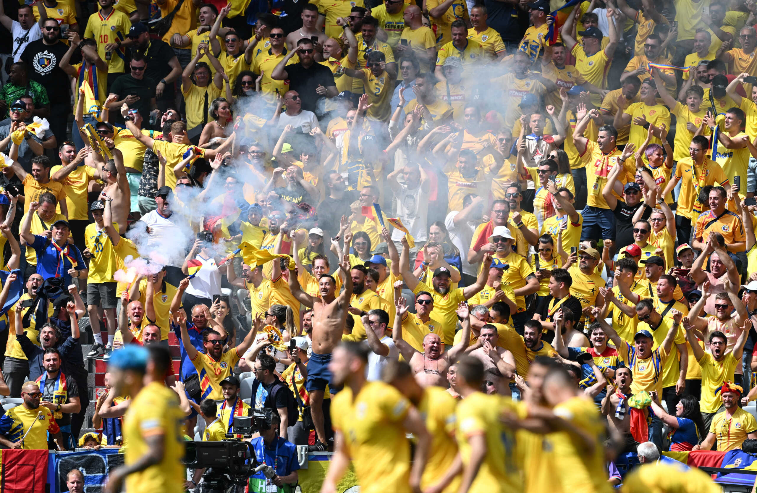 Soccer Football - Euro 2024 - Group E - Romania v Ukraine - Munich Football Arena, Munich, Germany - June 17, 2024 Romania fans set off smoke bombs in the stand after Nicolae Stanciu scored their first goal REUTERS