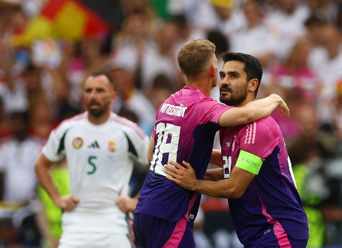 Soccer Football - Euro 2024 - Group A - Germany v Hungary - Stuttgart Arena, Stuttgart, Germany - June 19, 2024 Germany's Ilkay Gundogan celebrates scoring their second goal with Maximilian Mittelstadt REUTERS