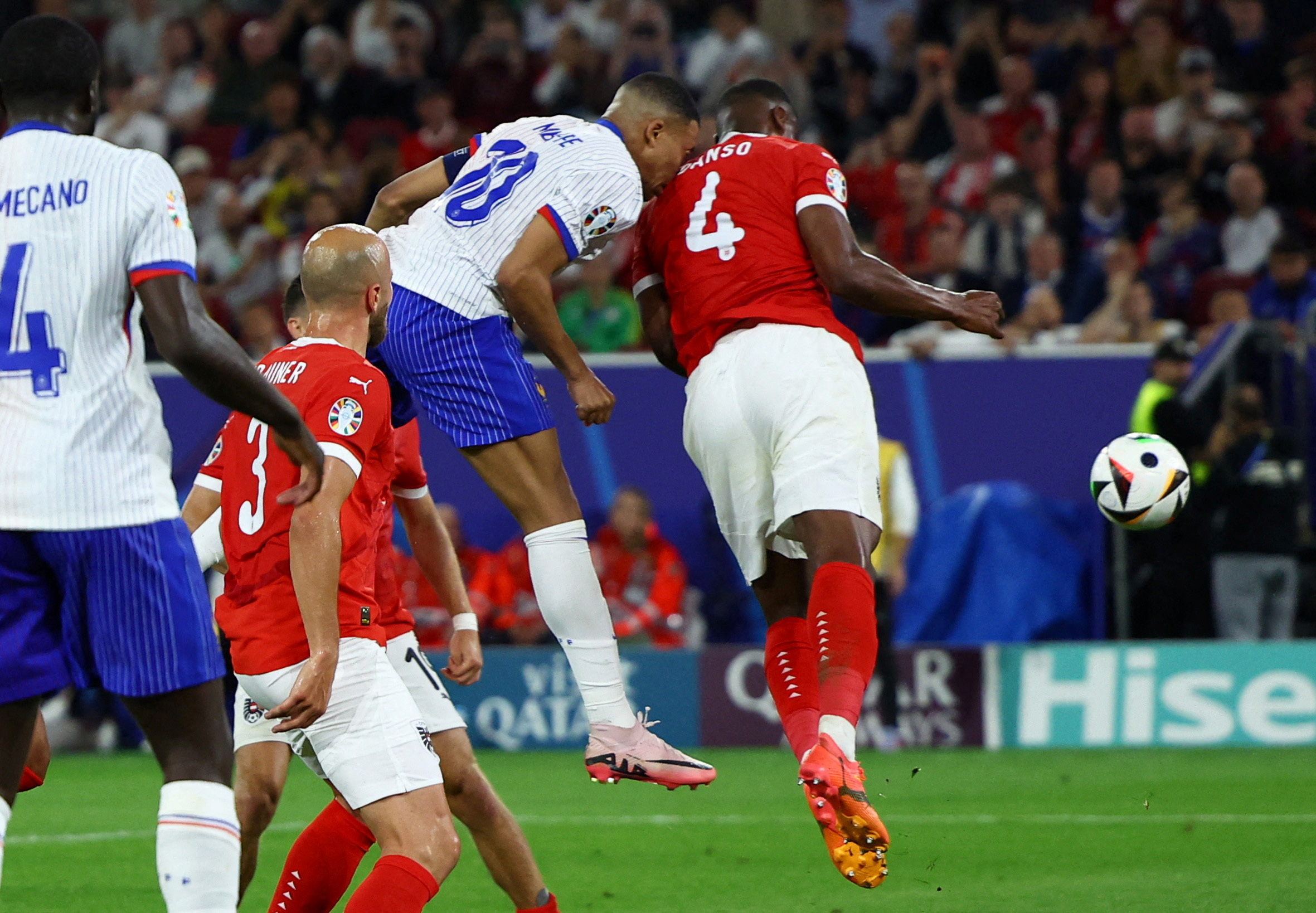 Soccer Football - Euro 2024 - Group D - Austria v France - Dusseldorf Arena, Dusseldorf, Germany - June 17, 2024  France's Kylian Mbappe collides with Austria's Kevin Danso and later sustains an injury REUTERS