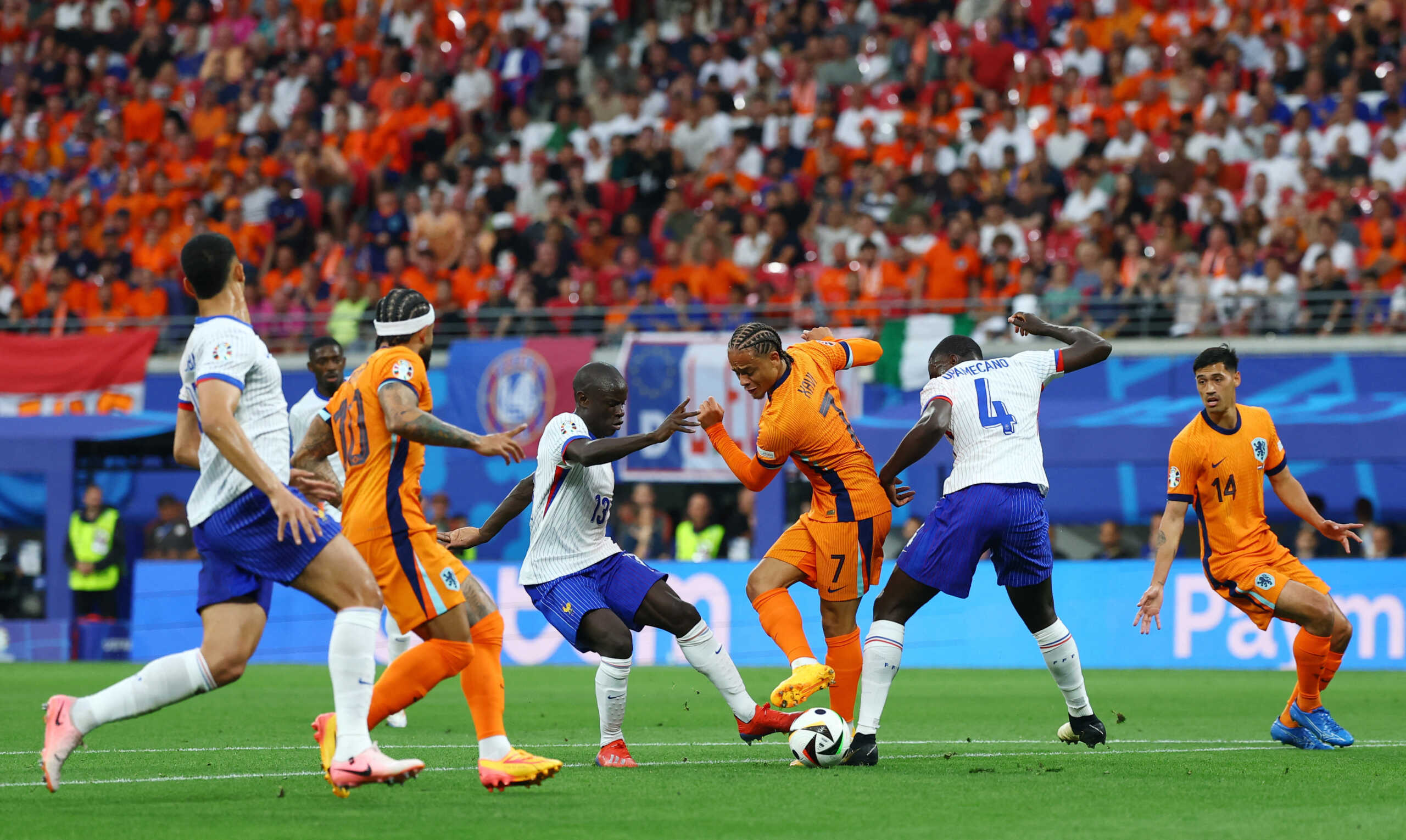 Soccer Football - Euro 2024 - Group D - Netherlands v France - Leipzig Stadium, Leipzig, Germany - June 21, 2024  Netherlands' Xavi Simons in action with France's N'Golo Kante and Dayot Upamecano REUTERS