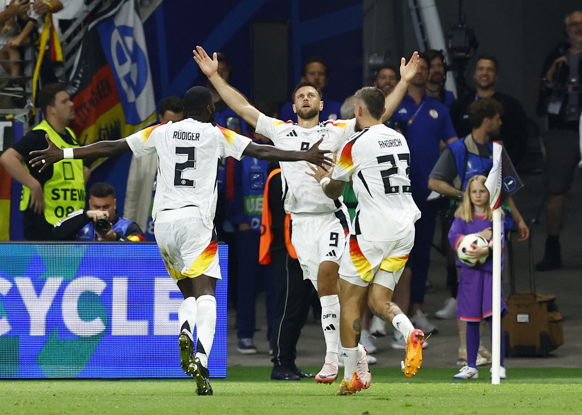 Soccer Football - Euro 2024 - Group A - Switzerland v Germany - Frankfurt Arena, Frankfurt, Germany - June 23, 2024 Germany's Niclas Fullkrug celebrates scoring their first goal with Antonio Rudiger and Robert Andrich REUTERS